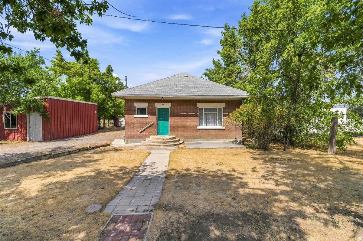 Affordable, charming, and full of potential! If you've been searching for a true starter home in the low $300s without settling for a townhome, this is the opportunity you've been waiting for. This classic brick home is full of vintage charm and character while offering updated plumbing and electrical for added peace of mind. Inside, you'll find a warm, inviting space with endless potential to update and make it your own. Outside, enjoy a detached garage, a spacious shop that's perfect for hobbies, storage, or projects, automatic sprinklers, and a mature apple tree that adds to the home's established charm. Whether you're a first-time homebuyer, looking to downsize, or searching for an investment property, this home offers the space, character, and value that's becoming harder to find. Don't miss your chance to own a single-family home in beautiful Mt. Pleasant at an affordable price! Square footage figures are provided as a courtesy estimate only and were obtained from recent appraisal .  Buyer is advised to obtain an independent measurement.