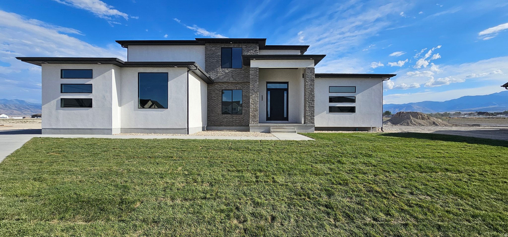 UNDER CONSTRUCTION:  Welcome to The Leah! This amazing home is being built in a cul-de-sac in Heritage Farms right across the street from three of the homes being built for the SL Parade of Homes. The Leah is a 4 Bedroom 2.5 Bath with Primary Suite on the Main level. *Home to include the following: Vaulted Ceilings in Primary bedroom and Living Room, LED Disc Lighting, Ceiling fan in Living room and Primary bedroom. Large walk-in closet in Primary suite. Tall decorative baseboards. LVP flooring in all main are as including bathrooms. Quality carpet in bedrooms. Fireplace in Living Room. *Kitchen: Soft close Knotty Alder Stained Cabinets and Granite Counter tops with Subway Tile backsplash. Cabinets featuring End Panels and Crown Moulding. Walk-in Pantry. Stainless under mounted sink with disposal, walk-in pantry, stainless steel refrigerator, induction stove top, oven, dishwasher and microwave that can be used as a convection oven. *Bathrooms: Tile surrounds in tub and showers. European glass in Primary ensuite. Adult height vanities. Taller, elongated toilets. Central HVAC, Energy efficient furnace, Tankless Water Heater. Passive Radon System included. *Garage & Exterior Features: Third car bay, garage door openers, and 30 year architectural roof shingles. Square footage figures are provided as a courtesy estimate only and were obtained from Builder Plans. Buyer is advised to obtain an independent measurement. -Photo is a rendering and not of the actual home. Photos are of a previous home build, color and options are subject to change.