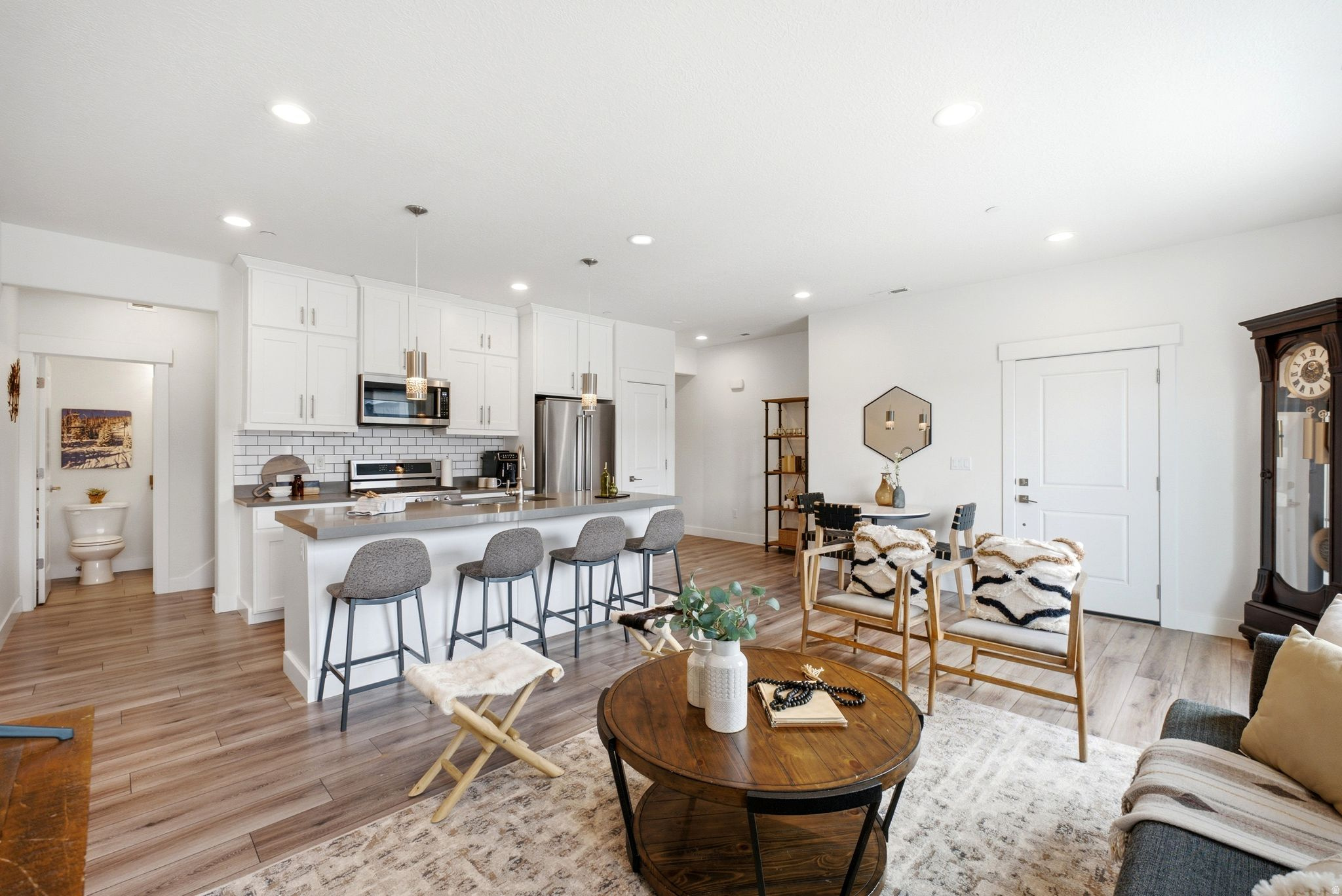 Private Pinebrook retreat in Quarry Springs - 2BD/2.5BA townhome with distant mountain views, covered deck, open-concept kitchen, community pool & hot tub, 2-car garage with EV charging. Located in the back of the development on a quiet cul-de-sac. Steps to skiing, trails & dining. Nightly rentals permitted.