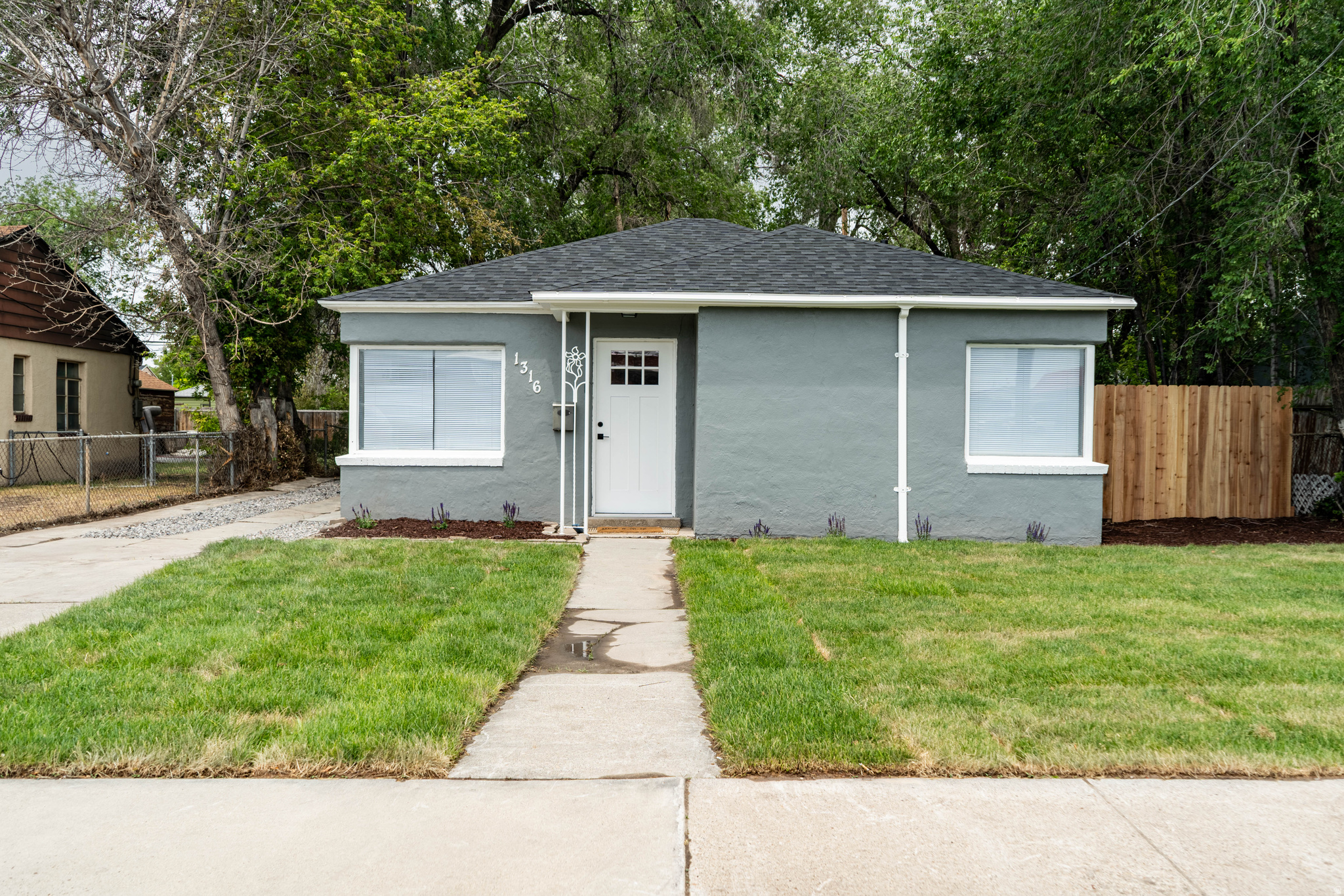 This charming and fully remodeled single-level 2-bedroom, 1-bath home is just hitting the market! This home features a top to bottom remodel including ** NEW ROOF ** NEW CABINETS ** NEW COUNTERTOPS ** NEW APPLIANCES ** NEW BATHROOM ** NEW PAINT ** NEW LIGHTING AND PLUMBING FIXTURES ** NEW AUTO SPRINKLERS AND FRONT YARD LANDSCAPING ** Set on a generously sized lot, there are endless possibilities in the expansive back yard - ideal for gardening, entertaining, or even adding an ADU (zoning allows for attached and detached units). It offers a little breathing room while still being close to some of Salt Lake's best outdoor spots, including the Jordan River Parkway Trail and the International Peace Gardens. It's the kind of place that makes a lot more sense than continuing to pay rent. Whether you're looking for a sweet first home or a smart place to start building equity, this is it!