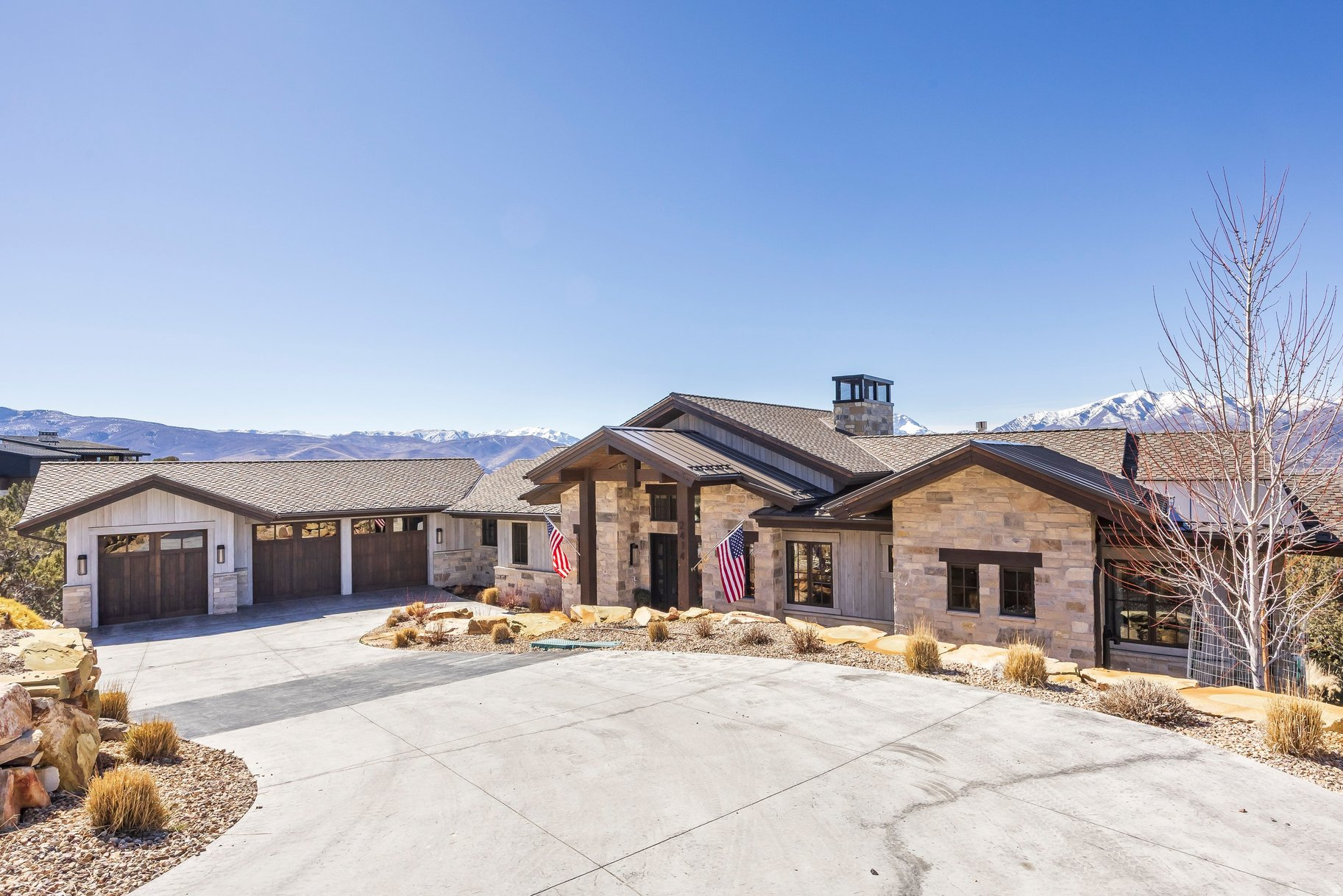 Perched within the private development of Red Ledges community, this exceptional residence captures the essence of refined mountain living. Thoughtfully designed to frame sweeping views of the Heber Valley, Mt. Timpanogos, and the surrounding Wasatch peaks, the home blends timeless architecture with elevated finishes throughout. Expansive windows, warm natural materials, and an open, inviting layout to create a seamless connection between indoor comfort and the stunning outdoor landscape. The gourmet kitchen, generous great room, and spacious outdoor living areas make the home ideal for both quiet relaxation and effortless entertaining. Luxurious bedroom suites offer privacy and comfort, while flexible spaces accommodate office needs, fitness, or guest overflow. Situated minutes from worldclass skiing, hiking, and the amenities of Red Ledges. This property has a Lifestyle Membership available with club deposit. A standout opportunity to own a beautifully crafted home in one of Utah's premier gated communities, where every day feels like a retreat.