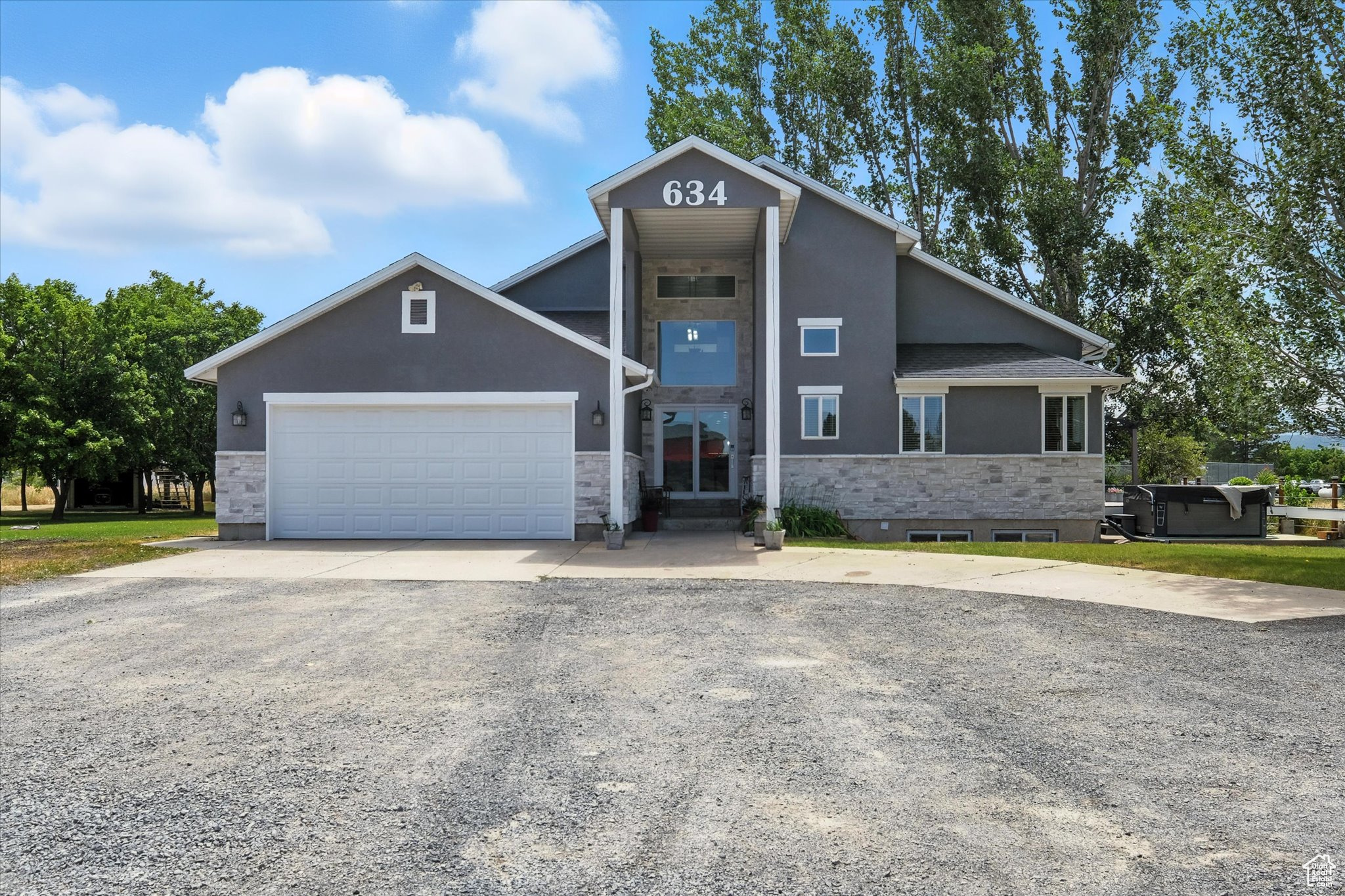 **PRICE IMPROVEMENT** DOWN $100,000.00. If you have been looking for a home in Paradise, this house has it all. Unique, private, completely updated home, large lot, AMAZING VIEWS, huge shop (30x80 with 15x80 lean/to), fenced garden area, playhouse, private drive to the house, basketball court, hot tub, Trim Light exterior lights, electric hookups for RV, new paint (interior and exterior), new carpet, new LVP, new roof within the last 6 months and these are just a few of the amazing things about this property. The property comes with a shared well and 1 water share. You have to come see this property to appreciate it. The location is hard to beat, you won't be disappointed. Call to schedule a showing today! Square footage figures are provided as a courtesy estimate only and were obtained from county records.  Buyer is advised to obtain an independent measurement.