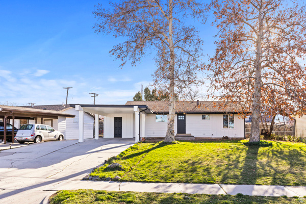 You have got to see this totally remodeled and updated house, it's adorable! 6 bedrooms and 2 and 1/2 baths, with a totally finished basement. New Windows and Doors throughout the house. Electrical and Plumbing have been updated. New cabinets and vanities. Also tubs and showers are new. Nice Hardy board has been put on the front of the house. Air conditioning is new and heater and water heater are fairly new. This home is close to plenty of shopping, schools, restaurants and I-15.  Come and see this great home!