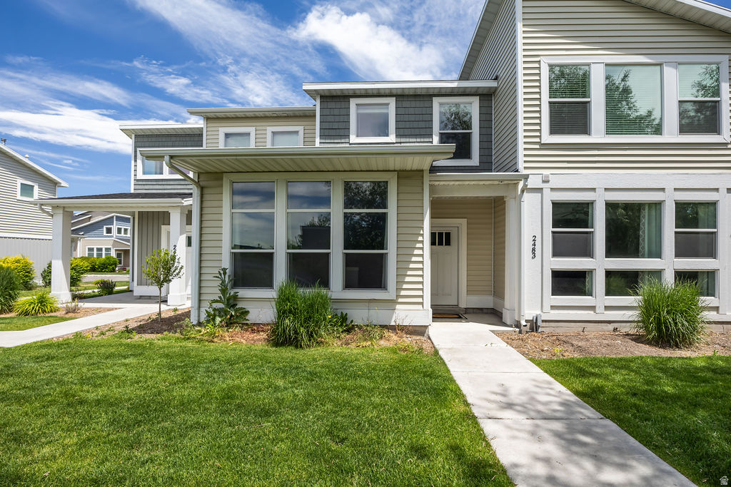 Floor-to-ceiling windows and vaulted ceilings bring standout natural light to 2483 S 1296 W, a bright 2-bedroom, 3-bath townhome in SPRINGCREEK CROSSING. Listed at $287,000, this 2017-built residence offers 1,465 square feet in the Logan/Nibley/River Heights area, making it a compelling option among Nibley homes under $350,000 and SPRINGCREEK CROSSING homes for sale. From the moment you step inside, the vertical volume of the vaulted ceilings and the wide reach of the windows help the main living spaces feel open, airy, and welcoming.  Inside, the open layout is enhanced by cheery sunshine, 2-tone paint, stainless steel appliances, and a kitchen pantry that adds everyday function. The kitchen, dining, and living areas are designed to feel connected, giving the home an easy flow for daily routines. Both large bedrooms include private full baths, creating comfortable separation and convenience, while the primary bedroom features a walk-in closet for added storage. Additional storage comes from the pantry and coat closet, and the  garage plus extra parking spot add practical value that many buyers search for in 2 bedroom homes in Nibley and homes for sale near Nibley.  This townhome is positioned in a fabulous location within the Springcreek Crossing subdivision, close to the broader Logan, Nibley, and River Heights area. For buyers comparing Nibley real estate, SPRINGCREEK CROSSING Nibley real estate, or 2 bedroom homes in SPRINGCREEK CROSSING, this listing offers newer construction, generous square footage, abundant natural light, storage, and parking in one clean package. Schedule a private showing of 2483 S 1296 W and see how this bright, open townhome compares to other homes for sale in Nibley and nearby