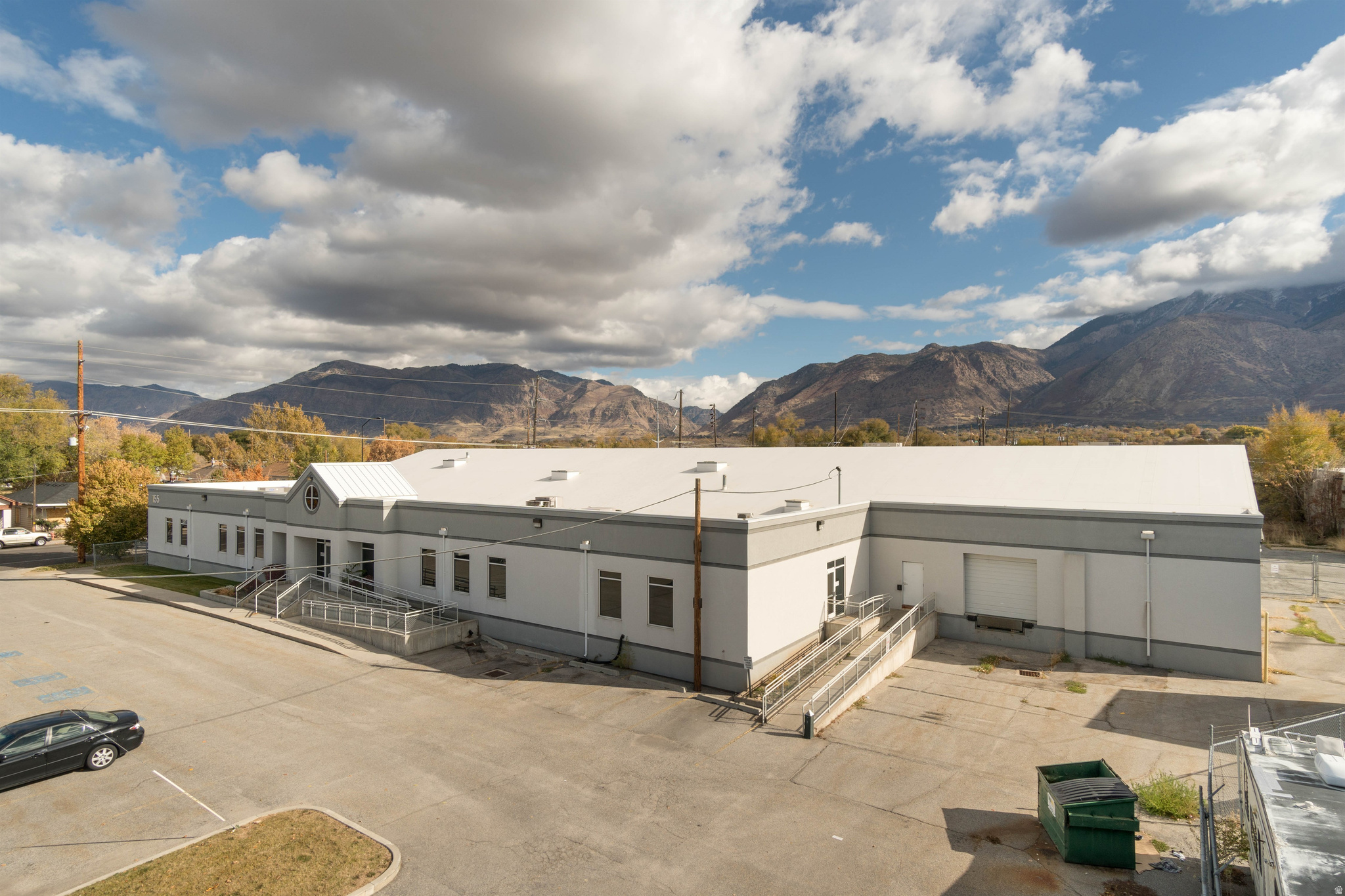 Rarely does a property of this caliber come to market in Downtown Ogden. This fully remodeled, 24,116 square foot, commercial building sits on 1.56 acres with 100+ parking stalls delivering the space, infrastructure, and location that serious businesses and savvy investors have been waiting for. Over 15,000 square feet of fully renovated office space - open floor plan, private offices, conference rooms, cubicles, a full kitchen, and modern finishes throughout. Whether you're relocating your headquarters, consolidating operations, or simply ready to stop leasing someone else's building, this is the space that makes a statement. The remaining 8,615 square feet of office and temperature-controlled warehouse space is currently leased, featuring a semi-truck dock, 10' x 10' overhead door, and 3-phase electrical service - providing immediate income from day one. HUBZone Certified - a significant advantage for government contractors seeking set-aside opportunities. ADA compliant, C-2 zoned, and freeway proximate. Owner-user: Own one of Ogden's most prominent commercial addresses and generate income from the warehouse tenant already in place instead of funding someone else's equity. Investor: This property comes with existing tenant income and 15,000 SF of office space ready for a quality tenant. Strong location. Clear upside. Day-one cash flow.
