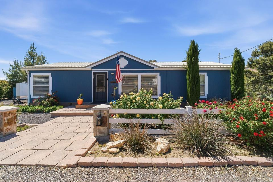 Located in the quiet mountain community of Central, Utah, this well-maintained and thoughtfully updated property offers comfort, usability, and extra space in one of Southern Utah's most desirable rural settings. Situated on a rare double lot totaling .68 acres, this property provides room for additional parking, trailers, recreational vehicles, outdoor storage, or future possibilities while still maintaining a clean and functional layout. The 3-bedroom, 2-bath home features approximately 1,344 sq ft and has seen extensive updates throughout. Recent improvements include a remodeled kitchen, updated secondary bathroom, new flooring, and exterior repaint completed in 2025. The home has been cared for exceptionally well and is move-in ready. Additional upgrades include a brand-new metal roof with snow stops, reverse osmosis water system, grading and landscaping improvements to the additional lot, and multiple exterior storage structures including sheds and covered storage areas that add excellent functionality for tools, toys, equipment, or seasonal storage. Furniture may be purchased separately. Located on a paved road with year-round access, the property offers the ideal balance of peaceful mountain living and convenience. Central is known for its mild four-season climate at approximately 5,280 feet in elevation, providing cooler temperatures than nearby desert communities while still being only about 30 minutes from St. George shopping, restaurants, medical facilities, and services. Outdoor enthusiasts will appreciate the close proximity to expansive public lands, trails, ATV access, hiking, hunting, and endless recreation opportunities right nearby. Whether you are looking for a full-time residence, mountain getaway, or investment property with room to spread out, this updated home and oversized lot offer a rare opportunity in a growing Southern Utah community.