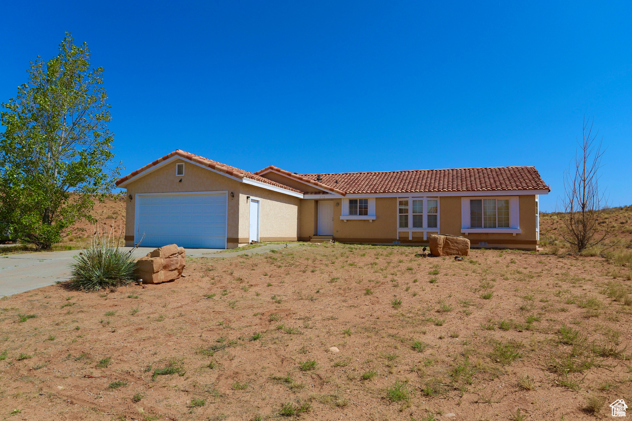 Under 300K!!  This won't last long!! And that's not all! With the sale of this awesome 4-bed, 2-bath home, you're also getting a houseboat and a ski boat included! Talk about a dream setup! Located in the peaceful community of Ticaboo, Utah, just minutes from the stunning North Lake Powell, this cozy 1603 sq ft home sits on a spacious 0.37-acre lot. As you step inside, you'll instantly feel at home with its warm, inviting atmosphere and the majority of the furniture is included, making it move in ready and waiting  for its new owner.  The back porch offers breathtaking Henry Mountain views where you can kick back and take in the beauty of the surrounding landscape. Whether you're into hiking, biking, UTV adventures, fishing, or just soaking up the outdoors, this area is a true paradise for adventure lovers. And when the day winds down, the dark sky setting offers some of the best stargazing you'll find anywhere, making this the perfect retreat to unwind. Bring an offer!!            Buyer to verify square footage of the home and property.