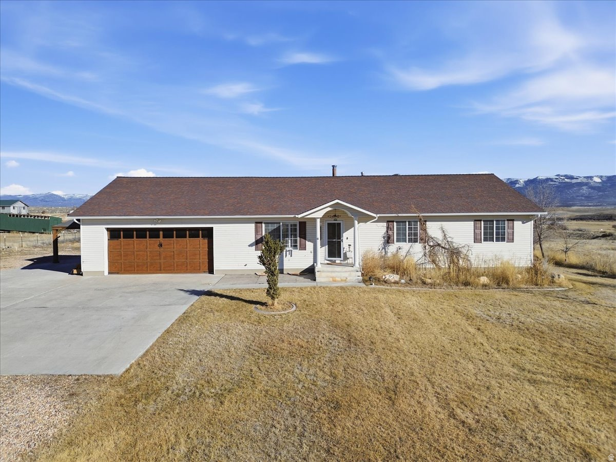 Spacious country living on 10  acres . This inviting home offers generous living spaces and is perfectly set up for entertaining, featuring a covered deck and a walkout patio ideal for gatherings, sunsets, and quiet mornings. Bring your horses  and./or have a hobby farm in beautiful Sanpete Valley  enjoy the freedom of wide-open land with plenty of room to roam. A large workshop adds exceptional functionality for hobbies, storage, or projects. Peaceful county setting with the perfect blend of privacy, space, and scenic beauty-this is rural living at its finest.  1 share of M&M Irrigation water, gazebo  and commercial washer/dryer are all included as well.  Buyer and buyer's agent to verify all information.