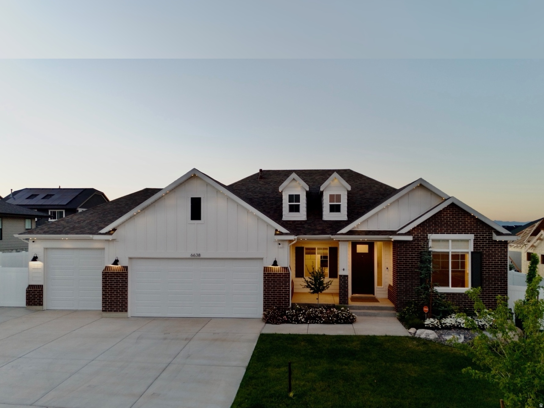 Skip the builder wait-and lock in a lower rate. This Craftsman-style rambler offers a rare 5.5% assumable VA loan and is now offered at a price point that's hard to match in today's market. Built just last year, the sought-after Concerto XL plan by Symphony Homes delivers a clean, modern layout with all the major upgrades already complete, including a finished backyard, completed basement, and thoughtful enhancements throughout-giving buyers more value from day one. It's also located in a highly desirable community with a very private pool, which is rare for a small, low HOA. The main level features vaulted ceilings and an open layout that feels connected without sacrificing space, along with a kitchen designed for hosting with a large island, quartz countertops, and abundant cabinetry. The primary suite offers a true retreat with a tray ceiling and a well-appointed bath with separate tub and shower. The basement provides a bright, open lower level with a large game room and is already plumbed for a future wet bar. Additional features include a fully finished backyard with a large patio, RV pad, solar panels, Google Fiber, water softener, reverse osmosis system, and permanent holiday lighting.