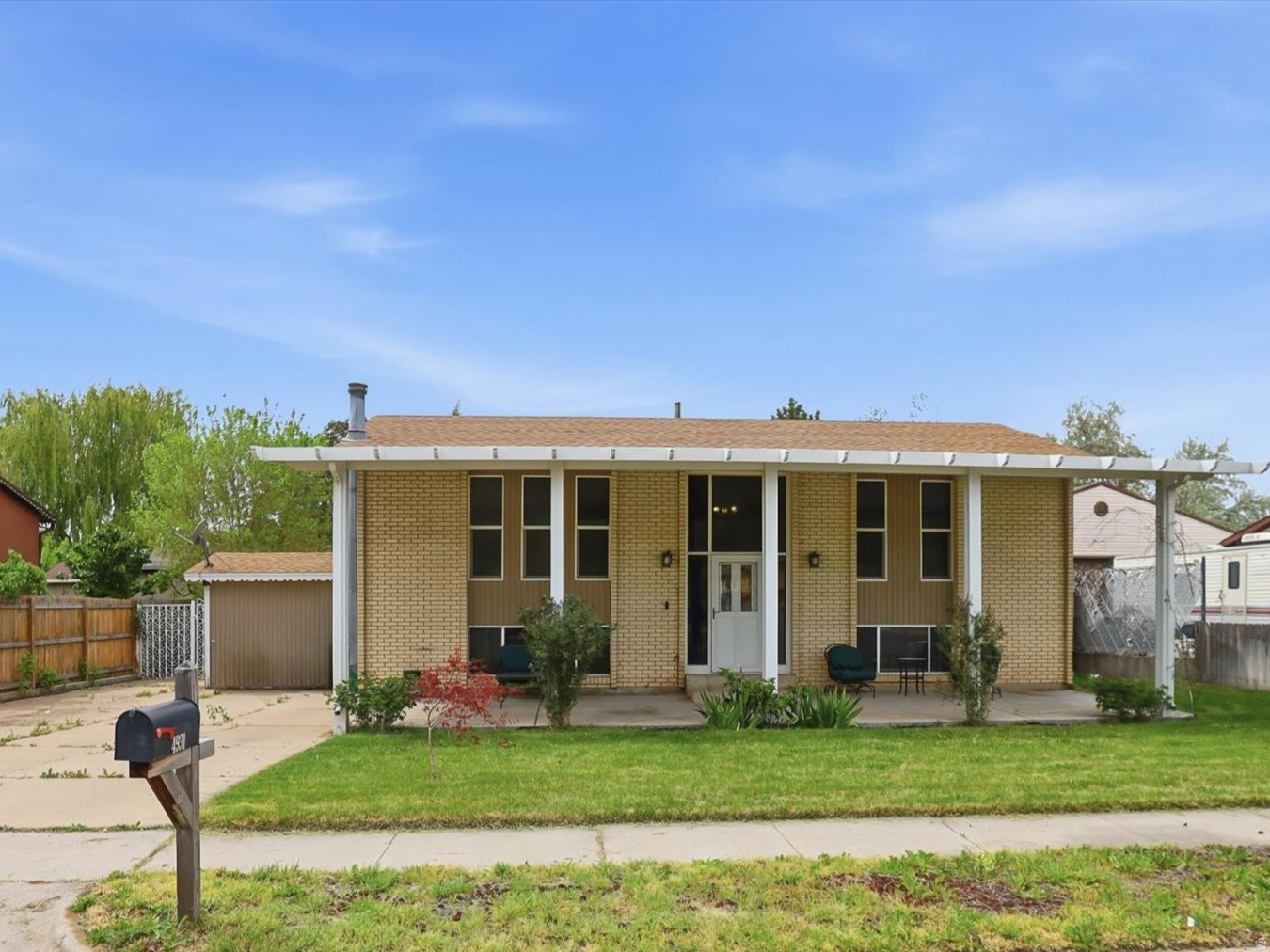 It's happening a HUGE price adjustment! This inviting 3-bedroom, 2-bath home blends curb appeal with practical living: a beautiful, oversized front porch, private fenced yard, and both a patio and deck create ample outdoor spaces for dining, play, and entertaining. The spacious primary bedroom serves as a serene retreat, and a generous lower-level family room with a walk-out expands your living options-perfect for media nights, a playroom, or guest space. Thoughtfully designed indoor and outdoor areas make this property ideal for buyers seeking comfort, versatility, and easy entertaining. Square footage figures are provided as a courtesy estimate only and were obtained from Weber County records. Buyer is advised to obtain an independent measurement.