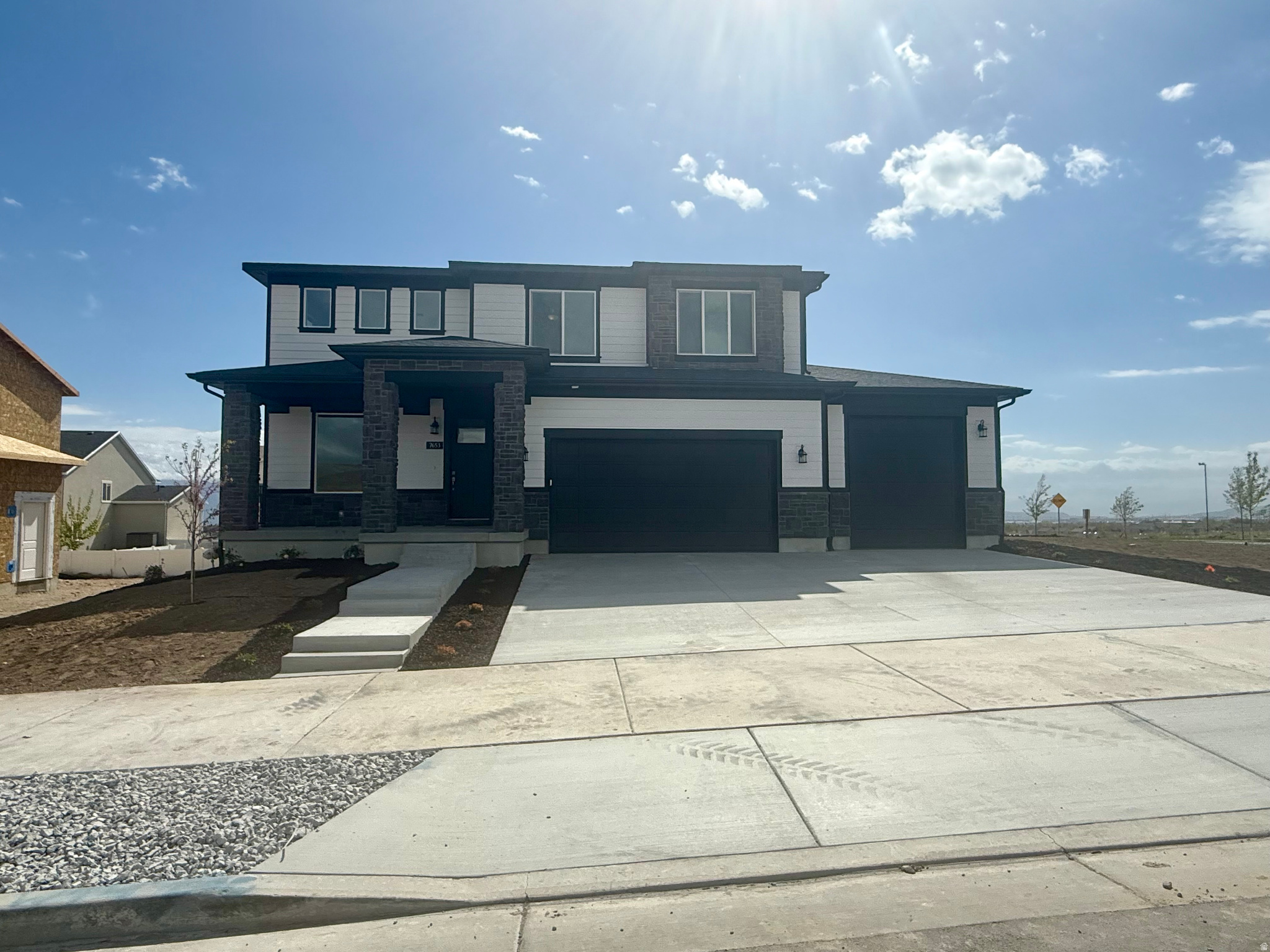 Brand new lot release in the beautiful Oquirrh West Community, which is close to major highways, shopping, airport, plus stunning views! Our 3 car garage lots are back, but hurry in as inventory is limited. Take one of our 6 floor plans and start building your dream home today! lot 403 is one of the few corner lots in this phase and is a whopping .20 acre new construction lot!  Perfect for 3 car garage, RV parking, and floor plan extentions if desired. Pick your own structural options, interior and exterior colors, and finish material. The price is listed at the base price with the lot premium included. Photos are of previously built Karli II homes. Contact the listing agents with questions or to schedule a tour.
