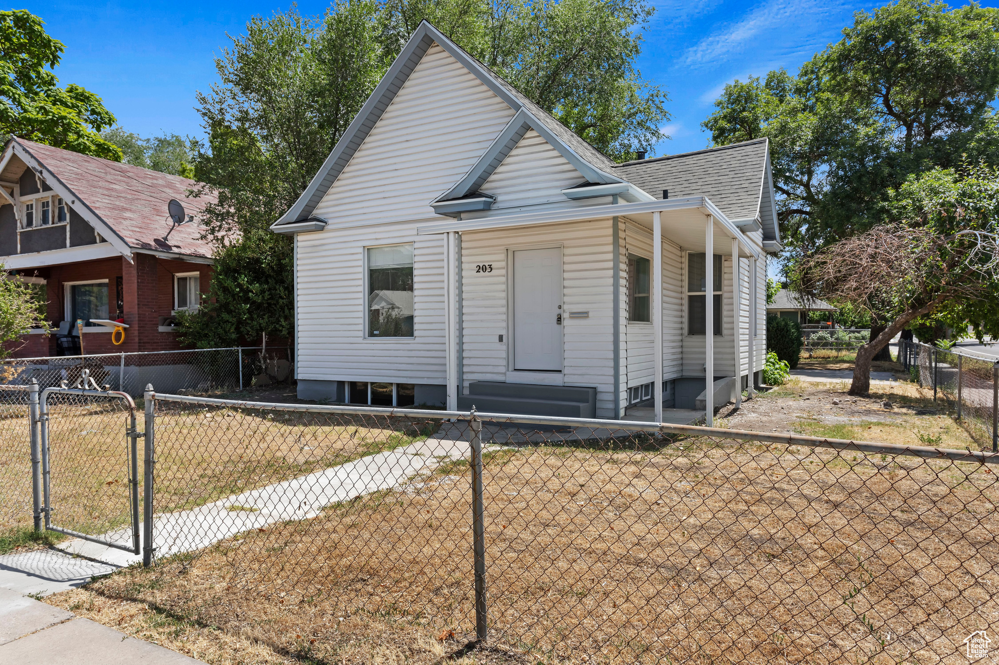 Discover the perfect blend of  location, opportunity, and versatility at 203 30th Street in Ogden. Recently updated in 2023, this spacious 2,448-square-foot home is an exceptional opportunity for homeowners and investors alike. Whether you're looking to offset your mortgage through house hacking or add a strong cash-flowing property to your portfolio, this home is set up for success.  The thoughtfully designed layout includes a separate basement entrance, offering outstanding potential for an accessory dwelling unit (ADU), multigenerational living, or additional rental income. With tenants already in place, investors can enjoy immediate income potential from day one.  Located just minutes from downtown Ogden, shopping, dining, schools, parks, and commuter routes, this property combines convenience with long-term value. Opportunities like this-where Location, flexibility, and income potentia come together-are increasingly hard to find.  Whether you're searching for your next home or your next investment, 203 30th Street delivers the space, updates, and opportunity to make your real estate goals a reality. Schedule your private showing today!   Square footage figures are provided as a courtesy estimate only.  Buyer is advised to obtain an independent measurement.