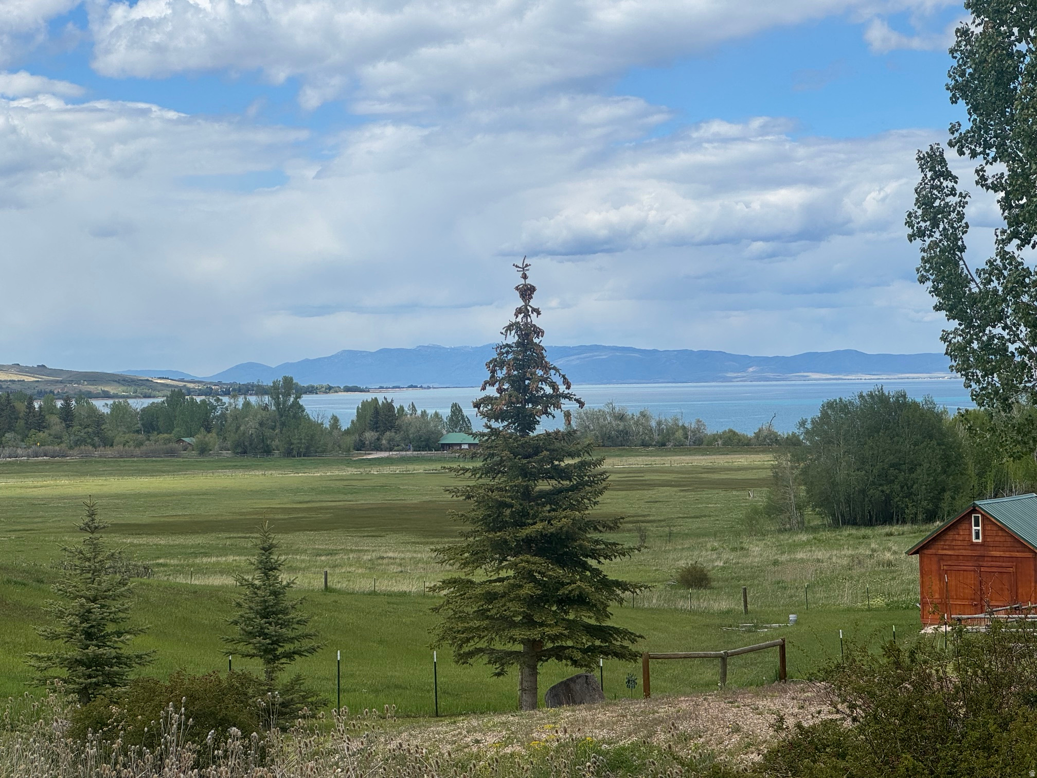 Swan Creek building lot overlooking meadow and beautiful Bear Lake. Close to Bear Lake State Park Marina - 2 minutes and Downtown Garden City for shops and dining. Beaver Mountain Ski Resort 20 minutes.  Short term rentals not allowed.