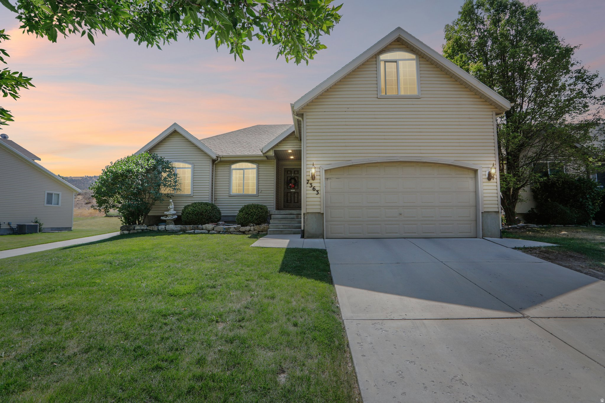 Wake up to mountain views, peaceful open space, and a backyard you'll never want to leave! This beautifully maintained home offers the perfect blend of privacy, comfort, and future potential in one of the area's most desirable neighborhoods. Backing directly to protected mountain green space with hiking trails and a neighborhood treehouse, you'll enjoy the rare luxury of having no backyard neighbors while still being just steps from Fremont Springs Park and conveniently located across from a local church. From the moment you enter, you'll appreciate the bright, open layout featuring soaring vaulted ceilings, a welcoming formal living room that also makes an ideal home office, and spacious gathering areas designed for everyday living and entertaining. The kitchen has been thoughtfully updated with granite countertops, a new convection oven, newer dishwasher, and refrigerator, making it as functional as it is beautiful. The spacious primary suite is the perfect place to unwind, complete with a luxurious ensuite featuring dual sinks, a relaxing jetted soaking tub, separate shower, and a large walk-in closet with ample storage. Downstairs, you'll find even more possibilities. The finished lower-level bedroom suite includes a beautifully tiled custom bathroom and a flexible fourth/fifth bedroom configuration separated by a partition wall, making it ideal for guests, teens, or a hobby space. Even better, there's still a substantial amount of unfinished basement ready for your vision. Add additional bedrooms, an oversized family room, a home theater, or even a full kitchen. With a separate basement entrance already in place, this home offers outstanding potential for an accessory apartment or private mother-in-law suite. Step outside and discover an outdoor space built for enjoying every season. The fully fenced backyard offers privacy and room to play, while raised garden beds, a large storage shed with loft, bunny hutches, a chicken coop with enclosed run, and mature landscaping create the perfect setting for gardening, homesteading, or simply relaxing with family and friends. This home has also been extensively upgraded for comfort, efficiency, and peace of mind, including: Owned 14-panel (4kW) Brio solar system-no lease payments and lower utility costs. New convection oven, newer dishwasher, and refrigerator. Newer 50-gallon water heater. Water softener and reverse osmosis drinking water system. Cozy gas fireplace. Garage workbench for projects and storage. Cold storage room beneath the porch with a convenient can rotation system. Radon mitigation system already installed. In addition to everything this incredible property offers, buyers may qualify for USDA or Utah Housing/FHA financing, making low or even no down payment financing a possibility for eligible purchasers. Homes with this combination of location, privacy, outdoor amenities, energy efficiency, and future income or multigenerational living potential are exceptionally hard to find. Don't miss your opportunity to make this one yours. Schedule your private showing today and experience everything this remarkable home has to offer!  **Buyer is advised to obtain an independent measurement. Buyer/Buyers Agent to verify all info including sq. ft.