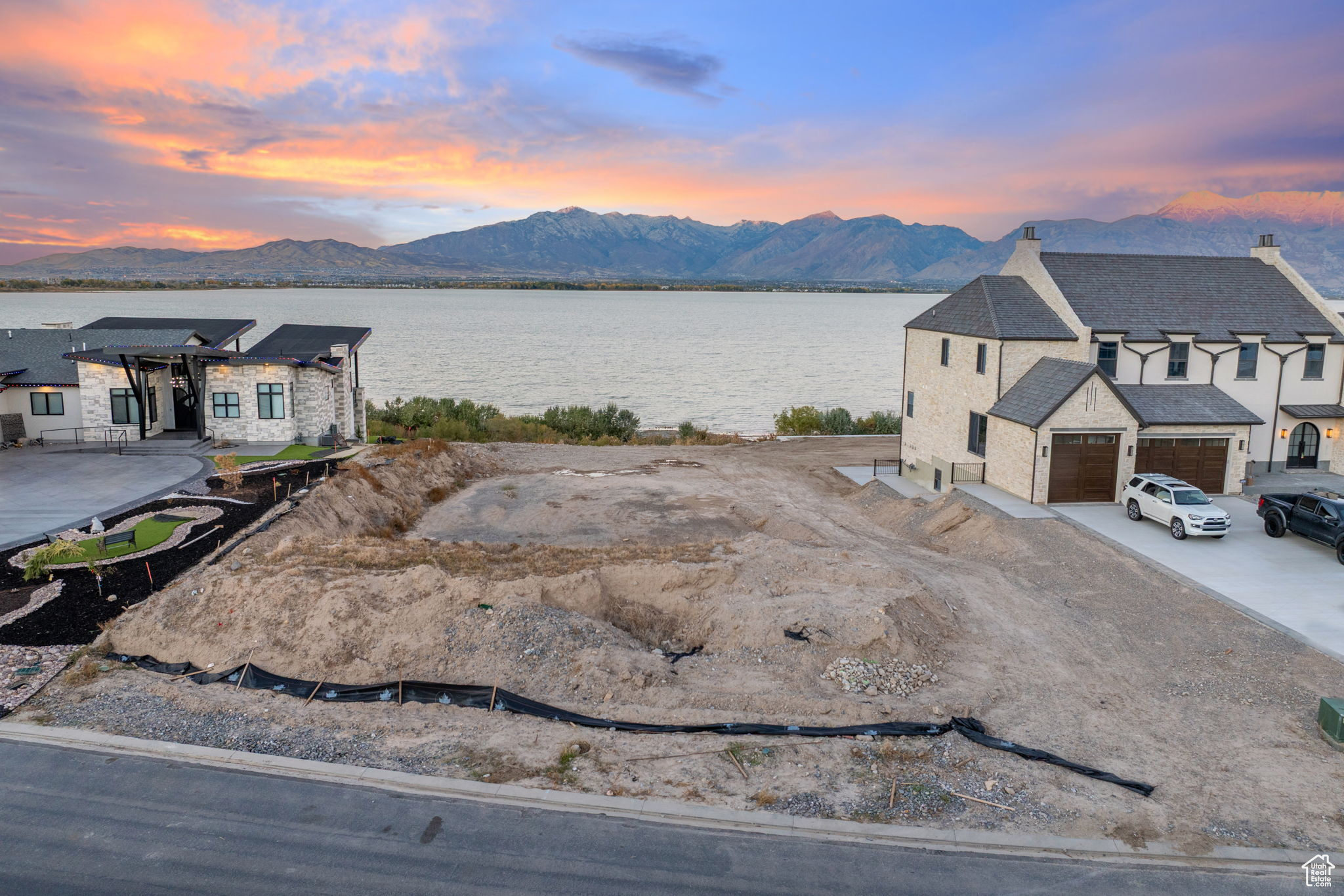 Lakeside Luxury at Its Finest! Build your dream home on this .443-acre premier waterfront-view lot. Located within an exclusive resort community, this homesite offers breathtaking lake and mountain views along with access to premium neighborhood amenities. Experience the perfect blend of serenity, sophistication, and resort-style living every day.  Square footage figures are provided as a courtesy estimate only and were obtained from County Records .  Buyer is advised to obtain an independent measurement.
