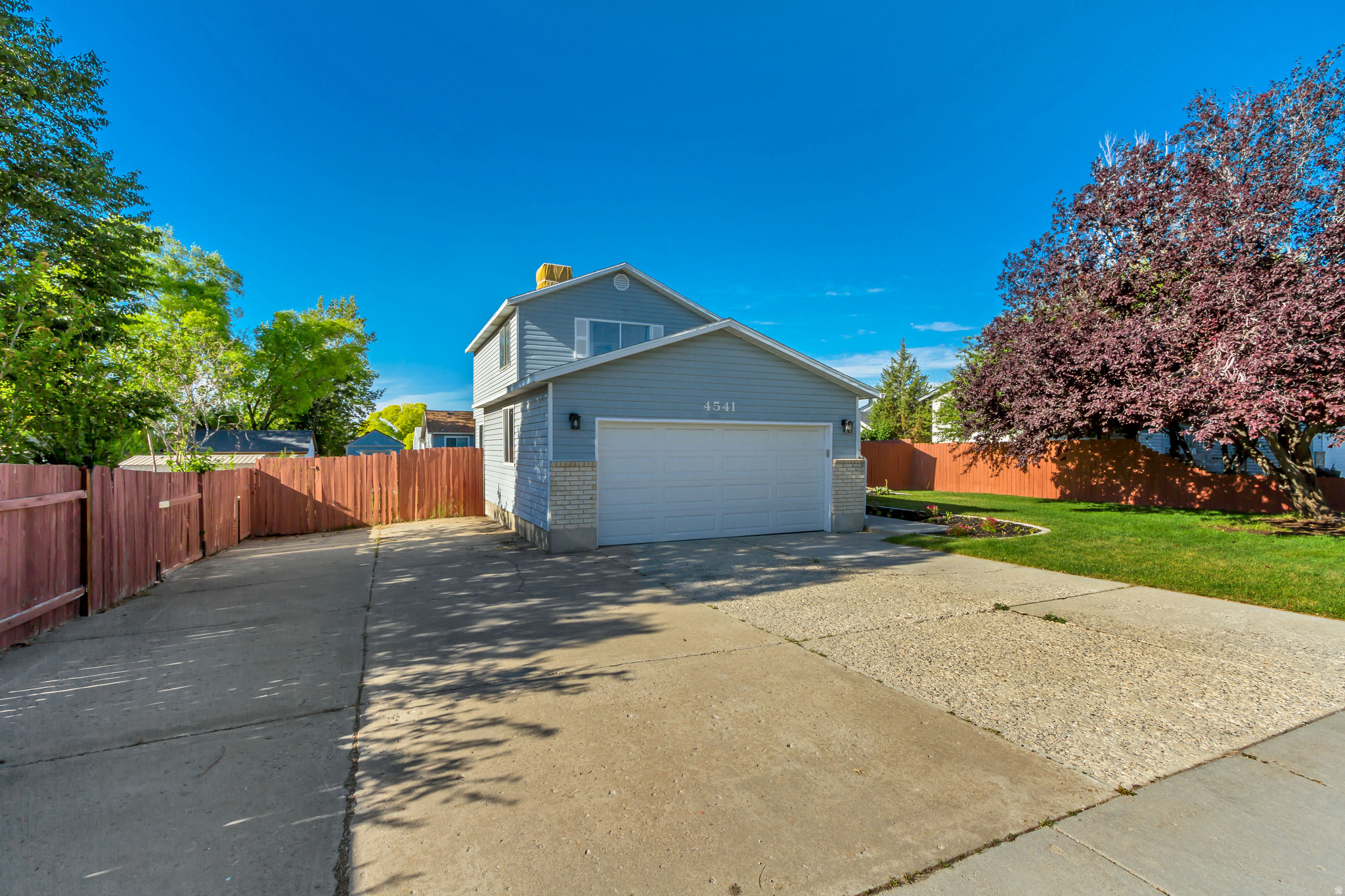 Great house on a quiet street, yet still close to Jordan Landing and main commuter roads. This open concept home with great natural light features a fully fenced yard, updated solid surface kitchen counters, fresh paint, and new flooring in many parts of the home. This tucked-away gem will go fast.
