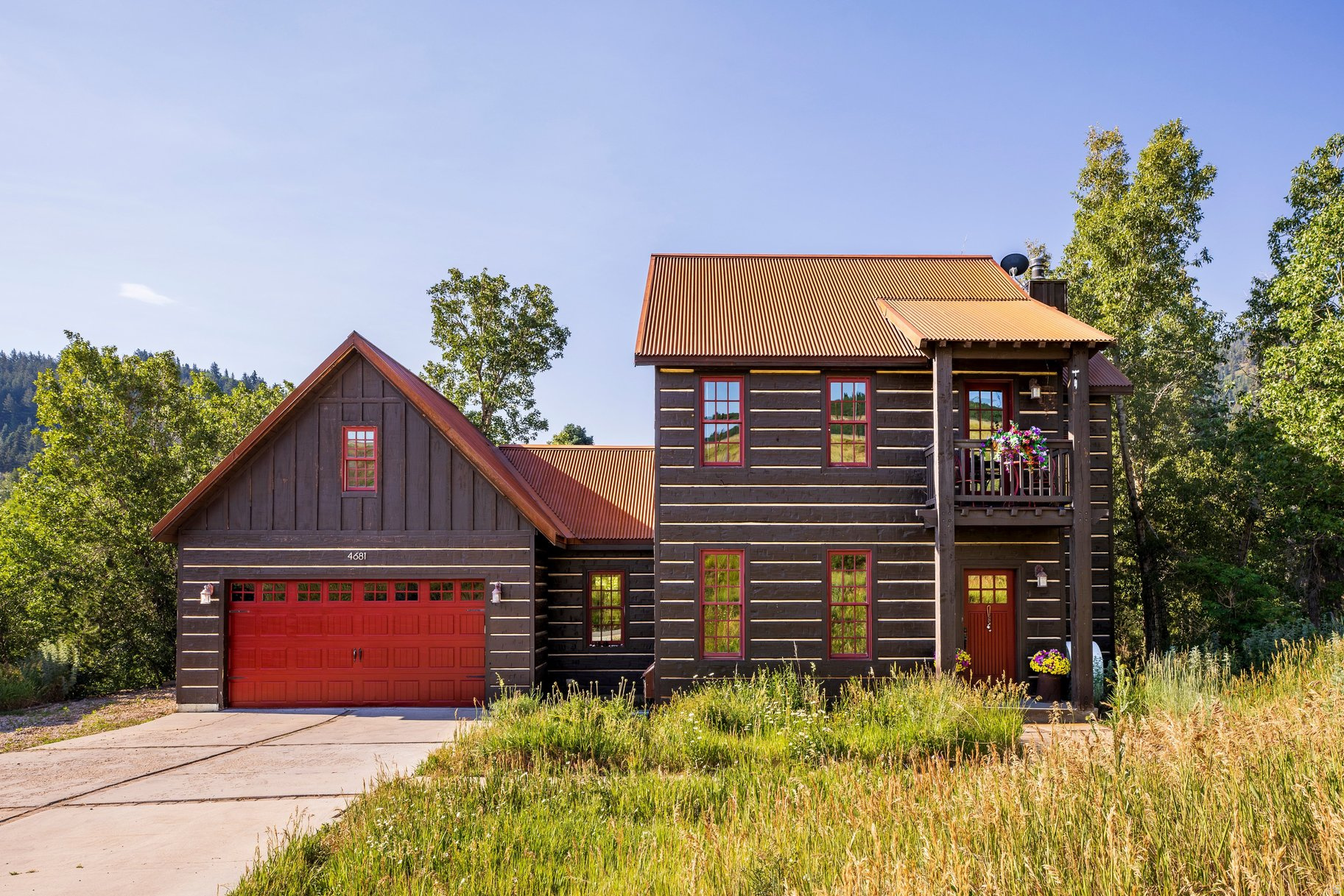 Located in the desirable Summit Park community, this charming mountain home offers the best of both worlds.  Nestled in a dog and family friendly neighborhood, surrounded by wildlife and nature and  just 15 minutes from Park City and Salt Lake City.   This two story home has an ideal floor plan with an open kitchen/family room with a dramatic stone gas fireplace that opens onto an expansive patio with towering trees and a stream as the backdrop.  The perfect setting for sipping a cup of coffee or evening barbecues.   The formal dining room and a half bath complete the main floor. There are three bedrooms and two bathrooms upstairs and an additional two bedrooms, a bathroom, laundry room and family room downstairs.   The main floor has wood floors and hard surface kitchen countertops.  Basement level has newer LVP flooring.  The two car attached garage with attic storage is an added bonus! This home has been loved by the original owners for 17 years.  Don't miss this opportunity to make it yours!   Convenient access to the Toll Canyon trail system.
