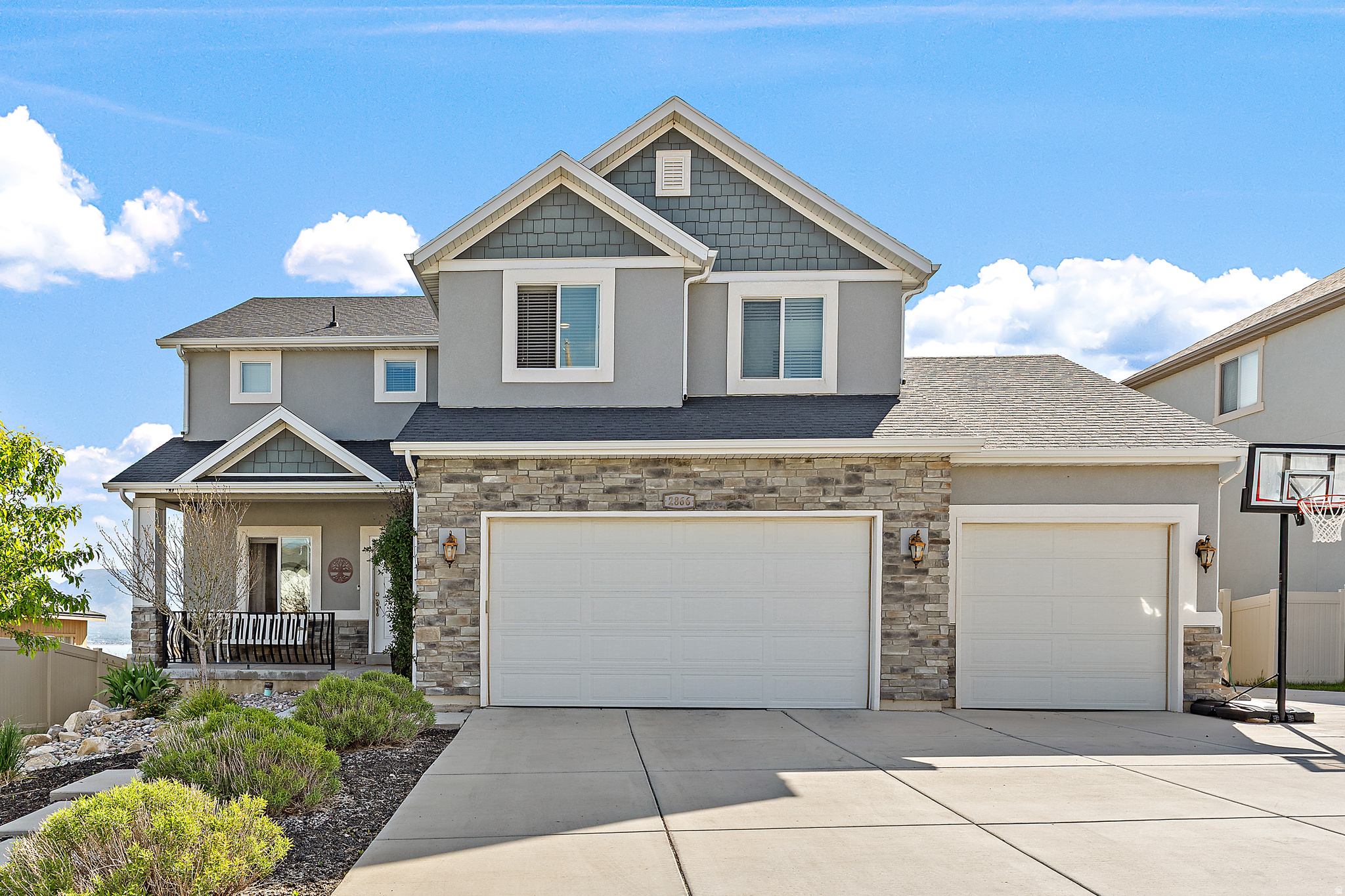 Our buyer couldn't get his financing. Don't miss this opportunity!Welcome to this stunning two-story home in Saratoga Springs, perfectly positioned to capture breathtaking views of the lake and surrounding mountains. This spacious 4-bedroom, 2-bath home offers an ideal blend of comfort, style, and functionality. The thoughtfully designed floor plan provides generous living spaces perfect for both everyday living and entertaining. The kitchen features a brand-new gas range still under warranty, making it a dream for home chefs. Plantation shutters on the east-facing windows allow beautiful morning light while adding elegance and energy efficiency. Throughout the home, brand-new ceiling fans enhance comfort and modern appeal. Major mechanical updates bring added peace of mind, including double water heaters replaced just last year, ensuring reliable hot water for years to come. The unfinished basement offers excellent potential, already plumbed for a future bathroom and featuring a walk-out entrance, providing flexibility for additional living space, a rental opportunity, or customized expansion. Step outside to enjoy a fully fenced and professionally landscaped yard, ideal for relaxing, entertaining, or enjoying Utah's incredible scenery. With stunning views, valuable upgrades, and room to grow, this home offers an exceptional opportunity to enjoy life in one of Saratoga Springs' most desirable locations.