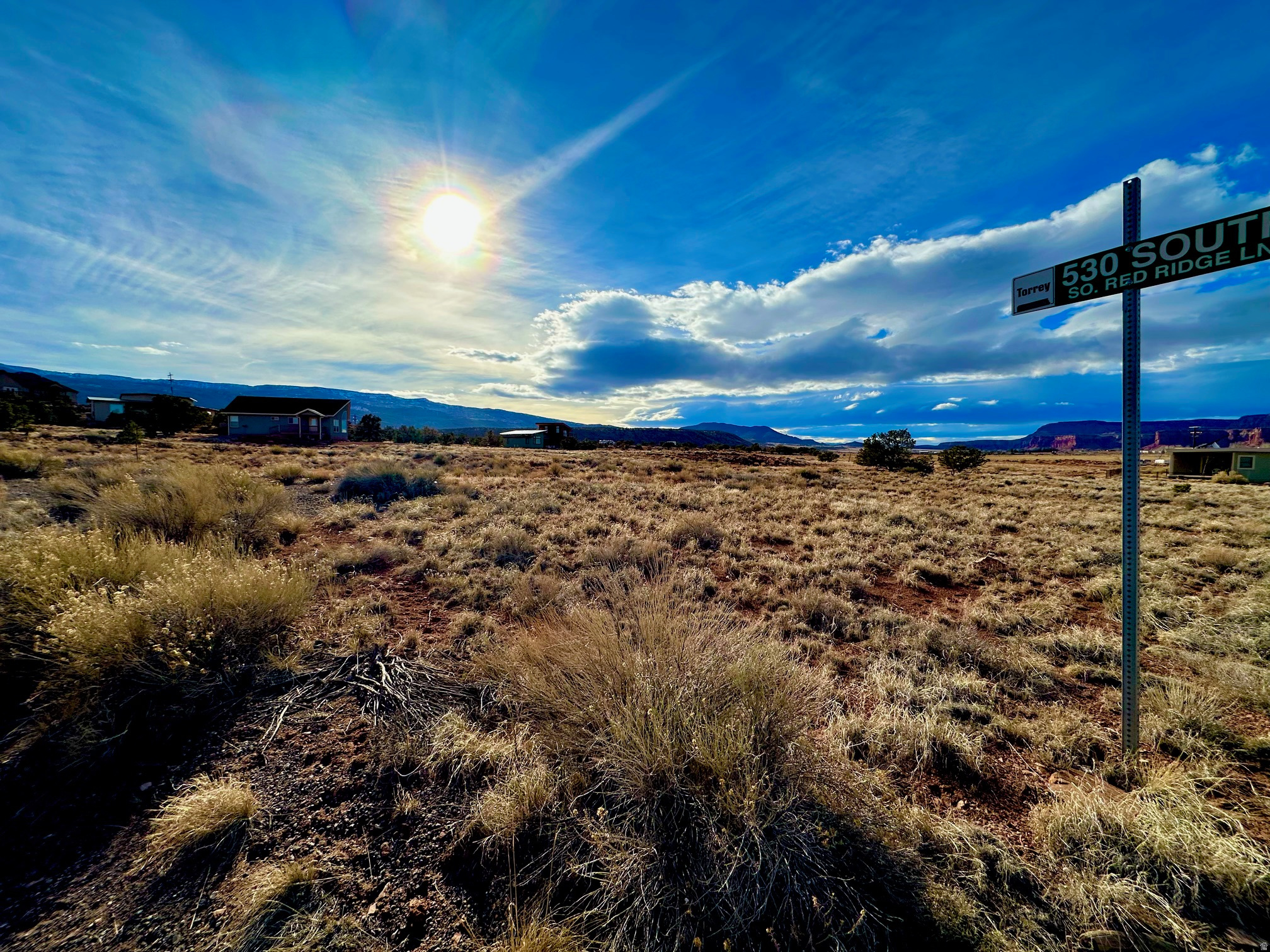 A rare opportunity to own land where beauty, privacy, and nature come together. Set on 1.15 acres in Torrey, Utah, this exceptional lot offers water and power available to the front of the property and breathtaking red rock views in every direction. Peaceful living, unforgettable sunsets, star-filled nights, and a true sense of privacy and space. Ideally located near Boulder Mountain and just minutes from Capitol Reef National Park, the property provides direct access to world class hiking, fishing, and outdoor recreation, and great wildlife. Whether envisioned as a full time residence, a refined vacation retreat, or an investment in one of Utah's most sought after landscapes, this one of a kind lot presents the perfect canvas to build a home surrounded by timeless beauty and views you'll never outgrow.