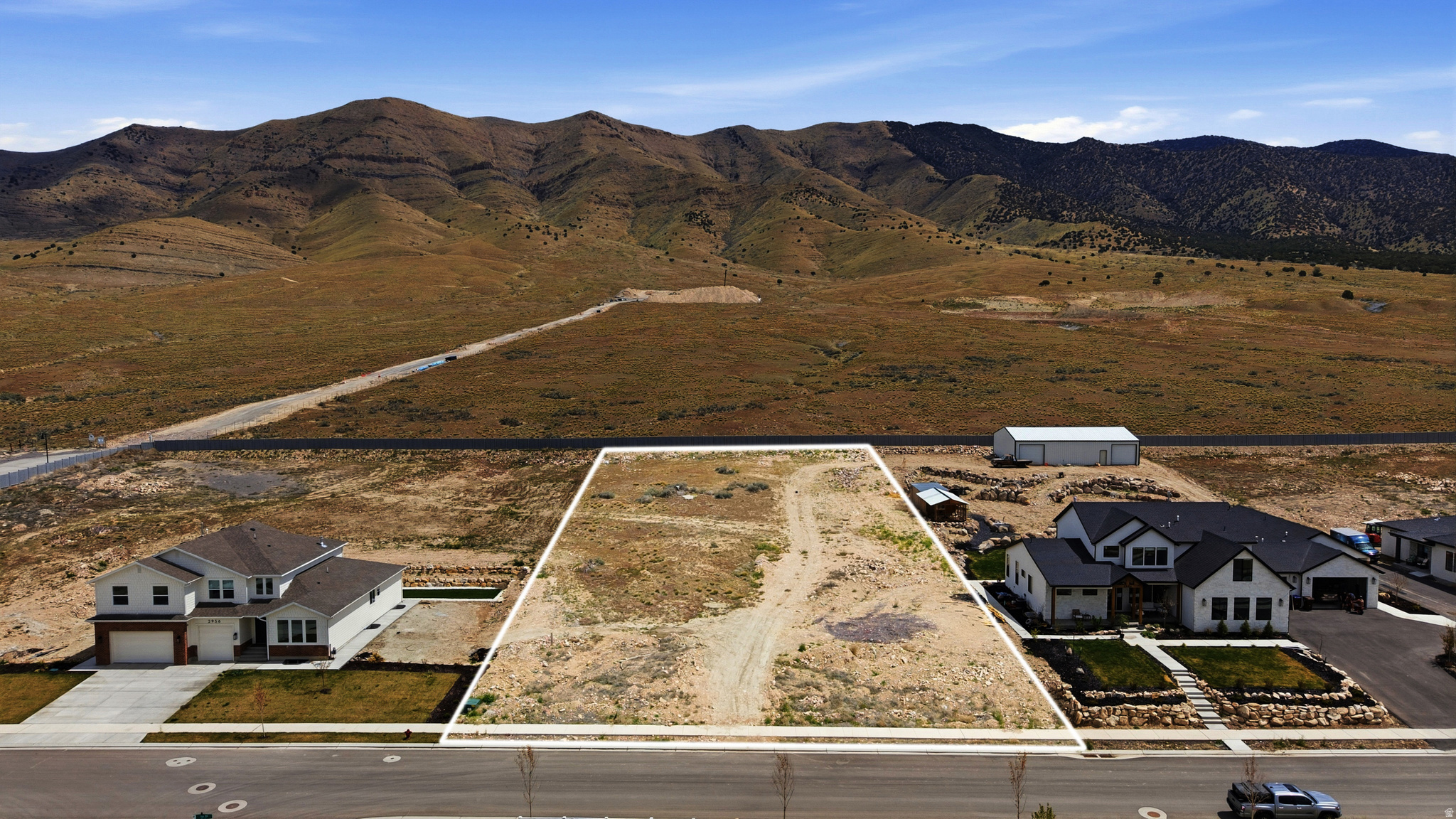 Envision your custom dream home on this scenic 1-acre horse property in Eagle Mountain! Breathtaking mountain and valley views, along with endless stunning sunrises and sunsets from your own private retreat. A blend of rural charm and modern convenience, country-like setting only minutes away from City Center shopping, dining, and schools. Easy access to biking, hiking, ATV, and horse trails. Horses, a garden, a shed, or even a detached garage or workshop, you have the space to create the lifestyle you've always wanted. Located in a neighborhood with John Hancock Charter School. Chickens and accessory dwelling units (ADUs) allowed. Connected to sewer (no septic tank). Fiber-optic internet included with HOA. Don't miss this rare opportunity to enjoy rural living with modern amenities!