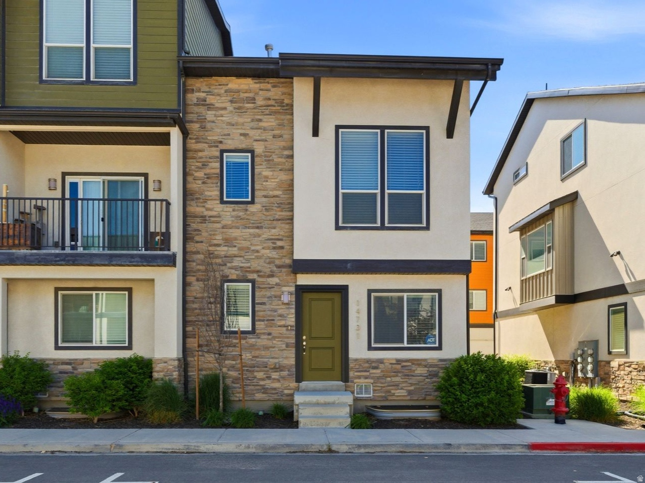 Nestled in the highly coveted Independence at the Point community, this stunning row-end townhome offers unbeatable convenience. As an end unit, you'll enjoy an abundance of natural light that pours into the open-concept main floor, highlighting dramatic vaulted ceilings that connect the living and dining spaces. This well-maintained property is move-in ready now with fresh, new carpet throughout. One of the standout features: each bedroom enjoys its own private bathroom, offering true en-suite comfort for household members, guests, or a work-from-home lifestyle that values privacy.  More Details You'll Love Expansion Potential: Need an extra guest suite or a private office? The unfinished basement is already equipped with plumbing hookups, offering a blank canvas to add a fourth bedroom and bath.  Stress-Free Maintenance: The HOA handles the heavy lifting, covering your high-speed internet, cable, snow removal, and exterior maintenance.  Garage & Storage: A spacious 2-car garage ensures your vehicles stay protected from the Utah winters, with extra room for gear.  An Unbeatable Location: Life in Bluffdale means having the best of both worlds. You are steps away from local dining and just minutes from the Silicon Slopes tech corridor and The Outlets at Traverse Mountain. For the outdoor enthusiast, the community boasts a splash pad, basketball courts, and a scenic trail system right outside your door.  Whether you're commuting to Salt Lake or Provo, the immediate access to I-15 and Bangerter Highway makes this the ultimate hub for work and play.