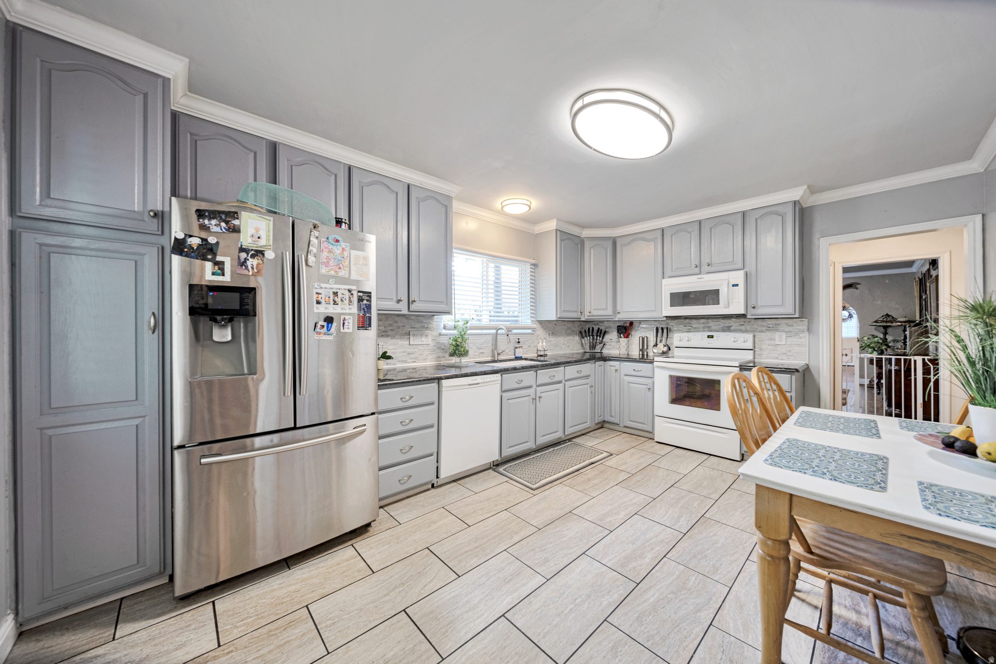 NEW WINDOWS UPDATED KITCHEN GREAT VIEWS OF WASATCH MOUNTAINS LOCATION LOCATION LOCATION HAS ZOING FOR A SECOND HOME