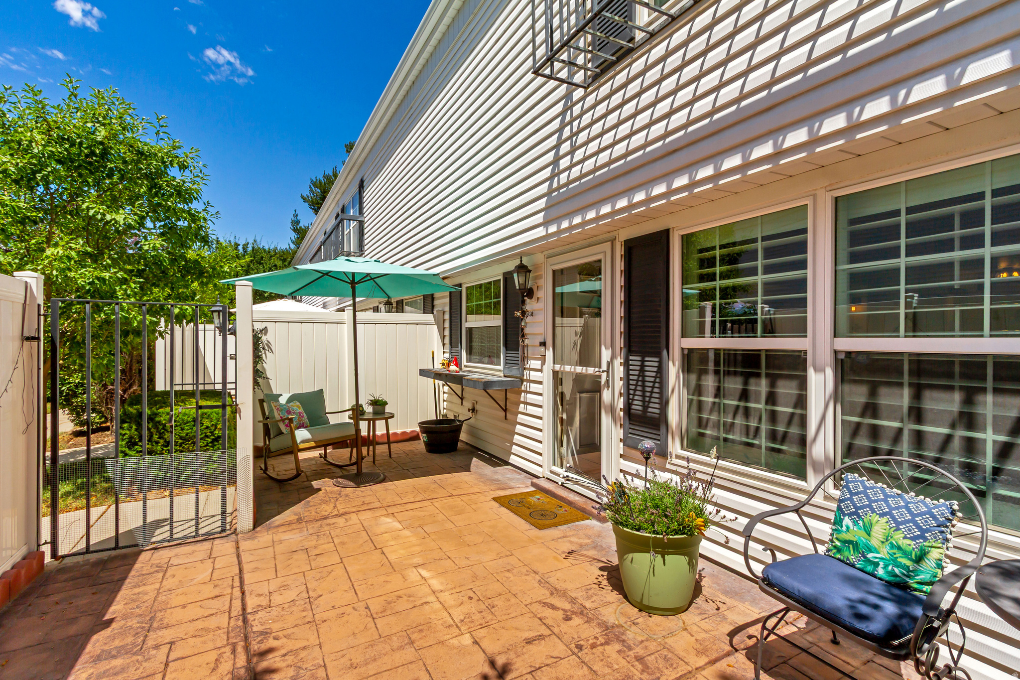 Beautifully maintained townhome featuring spacious rooms, generous closets, an updated kitchen, and an attached 2-car garage. Plantation shutters throughout and a private front patio. Enjoy a peaceful, tree-lined community with friendly neighbors, scenic walking trails, a tranquil pond, pickleball and tennis courts, plus indoor and outdoor pools. Pet friendly & conveniently located in Millcreek.