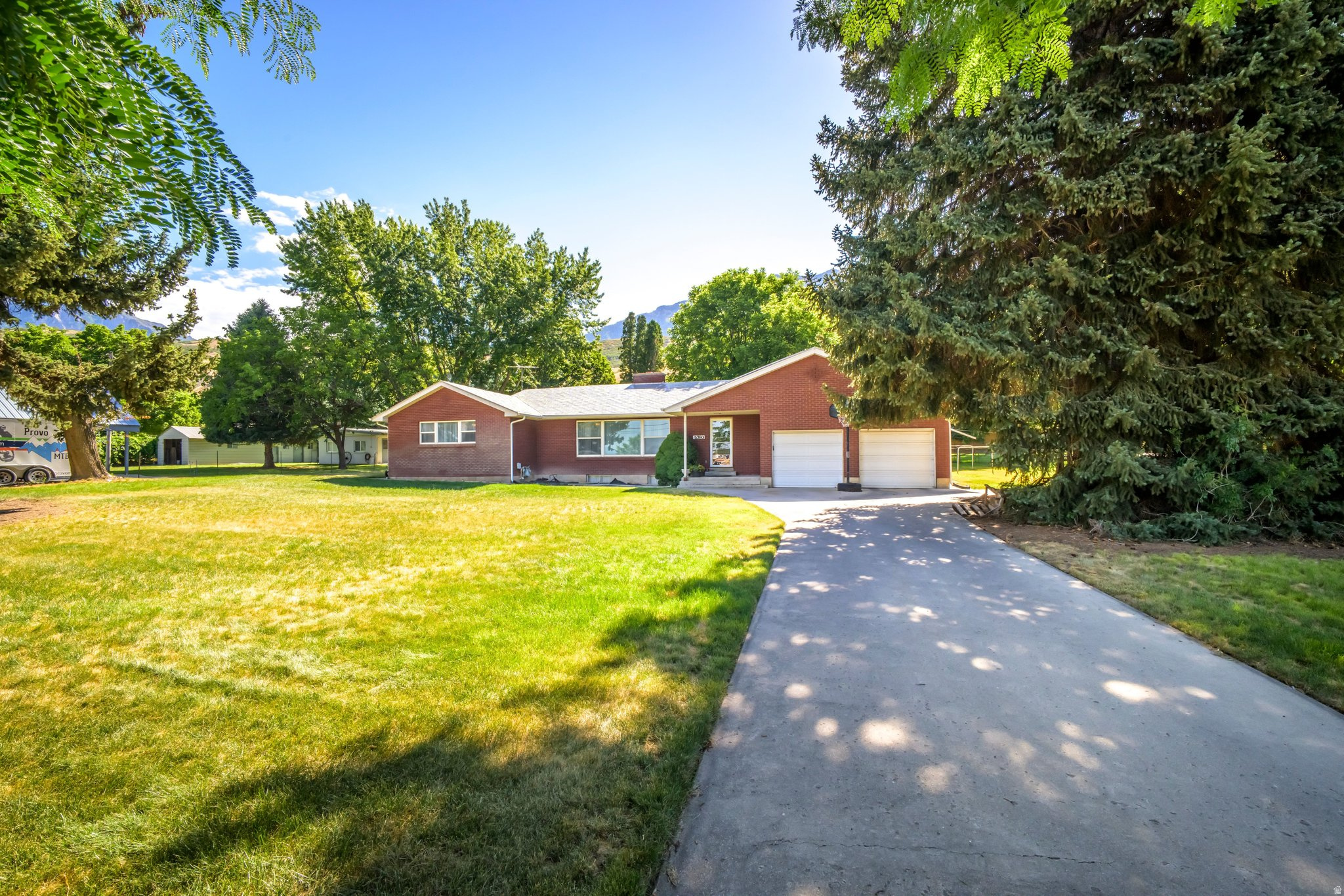 Rare opportunity in one of Provo's most desirable locations! Situated on .93 acres near Provo Canyon and just minutes from BYU, this property offers incredible potential for investors, builders, or buyers looking for a premier homesite. The existing 3-bedroom, 2-bath home was built in 1945 and is full of vintage character, featuring original metal kitchen cabinets, a charming pink GE wall oven, pink tile, green carpet, and other nostalgic details from a bygone era. While the home is being sold as-is and will require significant updating and repairs, including foundation work, it offers surprisingly spacious bedrooms, mature trees, aluminum shingles, and a newer water heater. The true value lies in the exceptional location, and future possibilities.  Whether you choose to restore the home's vintage charm, build your dream estate, or explore development opportunities, properties like this rarely become available in such a sought-after Provo location.