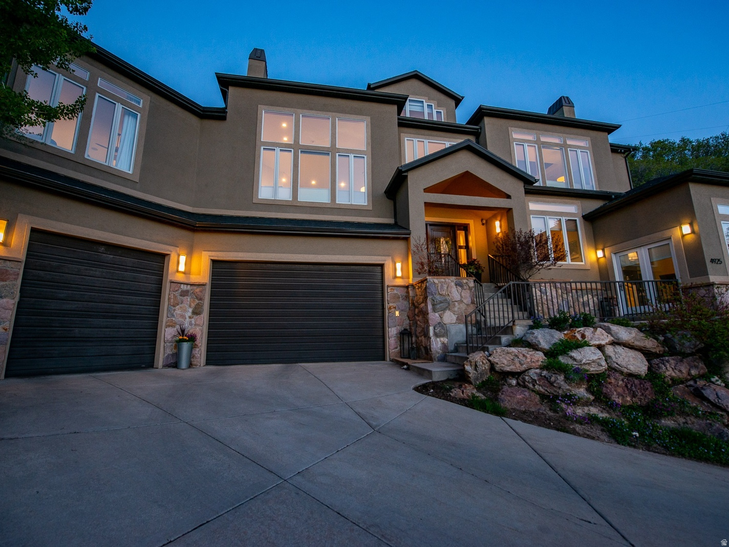 If you are looking for a home with sweeping valley views, Mt Olympus as your backdrop and a fun place to live, this is it! The views are so spectacular from every window and room in the home. Interactive spaces throughout the home make family get-togethers, parties or just interacting with everyone you share your life with easy, fun and fulfilling. Spaces are separate, yet flow easily into the next room  open and spacious. Relax on one of the many decks or the patio, enjoying the views of the Salt Lake Valley or the breathtaking mountainside. Take the respite you need from a taxing day of work or a busy agenda with a soak in the hot tub overlooking the Valley under a star-filled sky; it's just what you need. The thoughtful detail put into this home-including a nice integrated audio/video system, Google Fiber, an EV charging outlet, and energy-efficient solar panels-ensures this home works for you and your everyday needs. This home is filled with light. Sub-Zero fridge, three dishwashers, a drinks fridge, and a separate ice maker! Delightful spaces for your family and for entertaining guests. The living spaces inside and outside are wonderfully private and sit at the end of a cul-de-sac. Lots of thoughtful detail has been put into this home.