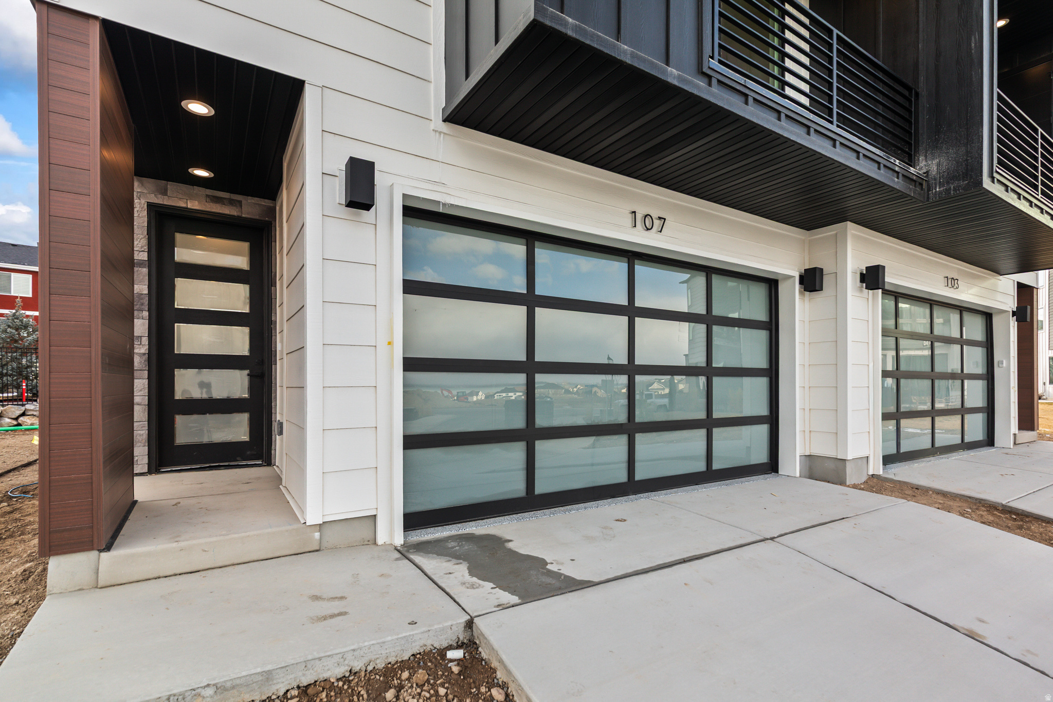 ** The model home is located at 64 Watson Dr. It is open Monday through Friday 11:00 am- 6:00 pm and Saturday from 10:00 am to 5:00 pm. **Experience elevated living in this stunning three-story luxury townhome located on the TalonsCove Golf Course and just moments from Utah Lake. Nestled in a prestigious resort-style community, this home offers the perfect blend of luxury, recreation, and scenic beauty.  The first floor features a versatile space ideal for a home office, guest room, flex area, or bedroom for those wanting to avoid stairs, along with a convenient half bathroom. The second floor showcases a bright open-concept layout with a spacious kitchen, dining, and living area. Floor-to-ceiling windows on both ends fill the space with natural light, creating an inviting and airy environment perfect for entertaining or relaxing.  This exceptional HOA community offers incredible amenities including a year-round natural heated mineral pool fed by local hot springs, a second outdoor swimming pool, two clubhouses with workout facilities and event space, and a private boat dock marina on Utah Lake. Residents also enjoy a large pavilion for hosting gatherings, multiple parks and playgrounds, and miles of connected walking and nature trails throughout the community.  The home itself is filled with premium and thoughtful upgrades including semi-custom soft-close cabinetry, 3 cm quartz kitchen countertops, a vent above the microwave, and high-end window and sliding glass door packages that enhance the home's modern design. The staircase is wider than standard homes and features a large statement window above the stairs that fills the space with light and adds to the luxurious feel.  Additional upgrades include 8-foot doors throughout, custom lighting, extra can lighting with ceiling fan wiring, soundproof walling in the toilet area for added privacy, internet access points installed in the walls, and plumbing for a water softener. The tankless water heater provides efficiency and convenience.  The garage is finished with durable epoxy flooring, an aluminum and glass garage door, added lighting, and a security camera for peace of mind.  Enjoy luxury living just steps from TalonsCove Golf Course and minutes from the water, where resort-style amenities, scenic surroundings, and modern design come together to create an exceptional place to call home.