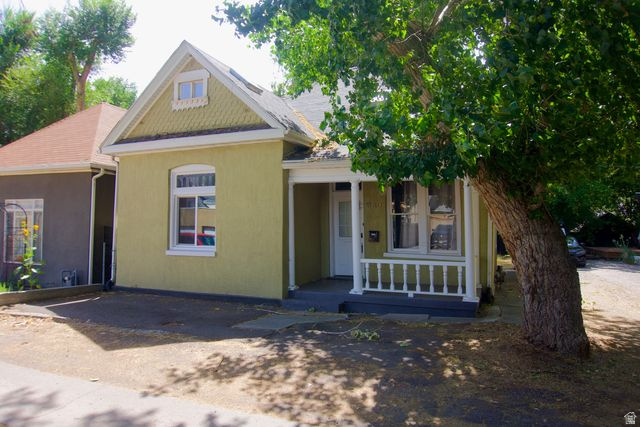 Charming bungalow in the heart of downtown Salt Lake City! This adorable home is perfectly nestled on a quiet horseshoe street just off the main roads, offering the ideal blend of peaceful living and city convenience. Enjoy easy access to public transportation and walk to all the dining, shopping, and entertainment downtown has to offer. Featuring a welcoming front porch and a private, fully fenced backyard with a deck, this home is perfect for relaxing or entertaining. The exterior was just repainted, adding fresh curb appeal to this already inviting home. Don't miss your chance to tour this quaint downtown gem-schedule your showing today!
