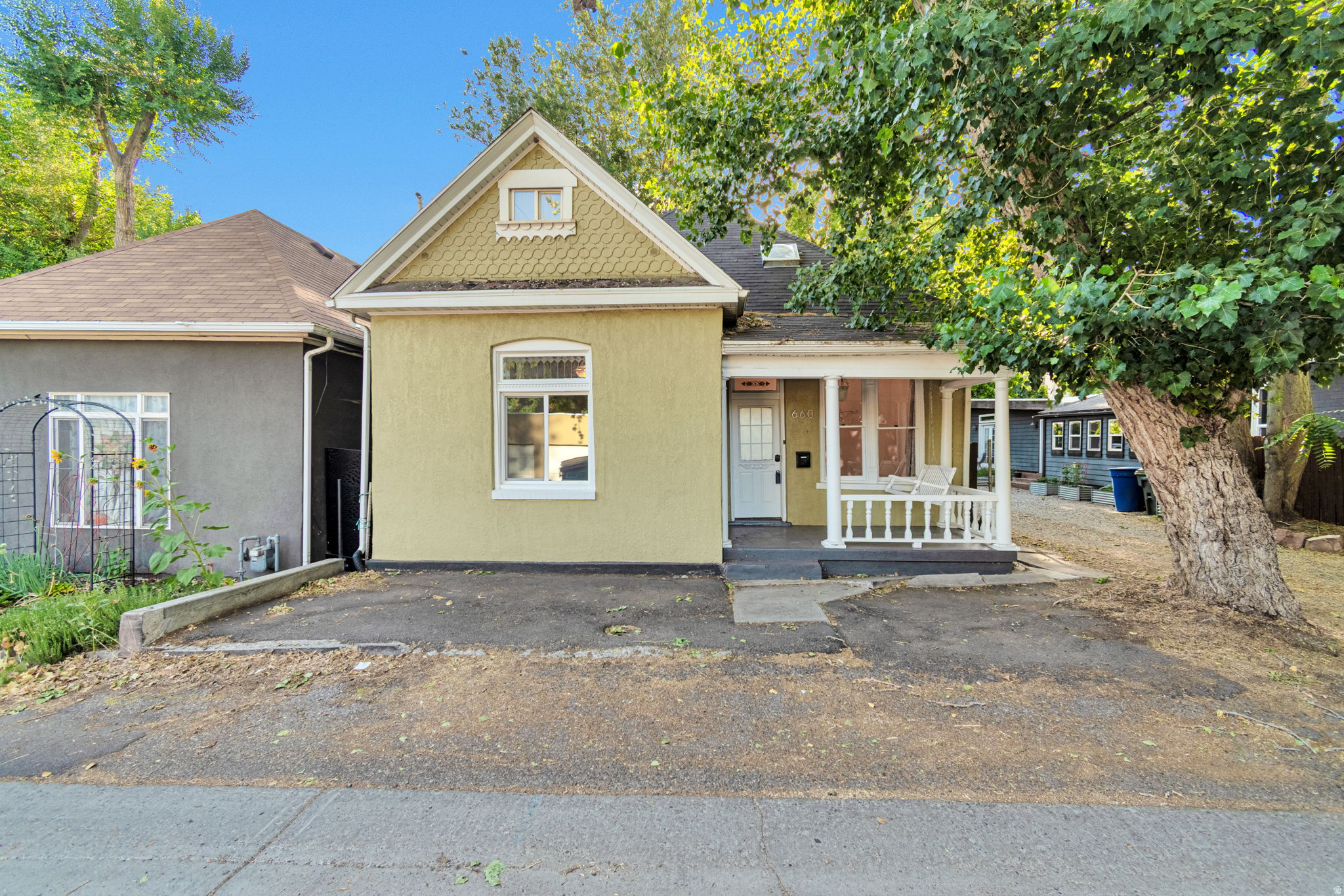 Charming bungalow in the heart of downtown Salt Lake City! This adorable home is perfectly nestled on a quiet horseshoe street just off the main roads, offering the ideal blend of peaceful living and city convenience. Enjoy easy access to public transportation and walk to all the dining, shopping, and entertainment downtown has to offer. Featuring a welcoming front porch and a private, fully fenced backyard with a deck, this home is perfect for relaxing or entertaining. The exterior was just repainted, adding fresh curb appeal to this already inviting home. Don't miss your chance to tour this quaint downtown gem-schedule your showing today! Off street parking in front of home.
