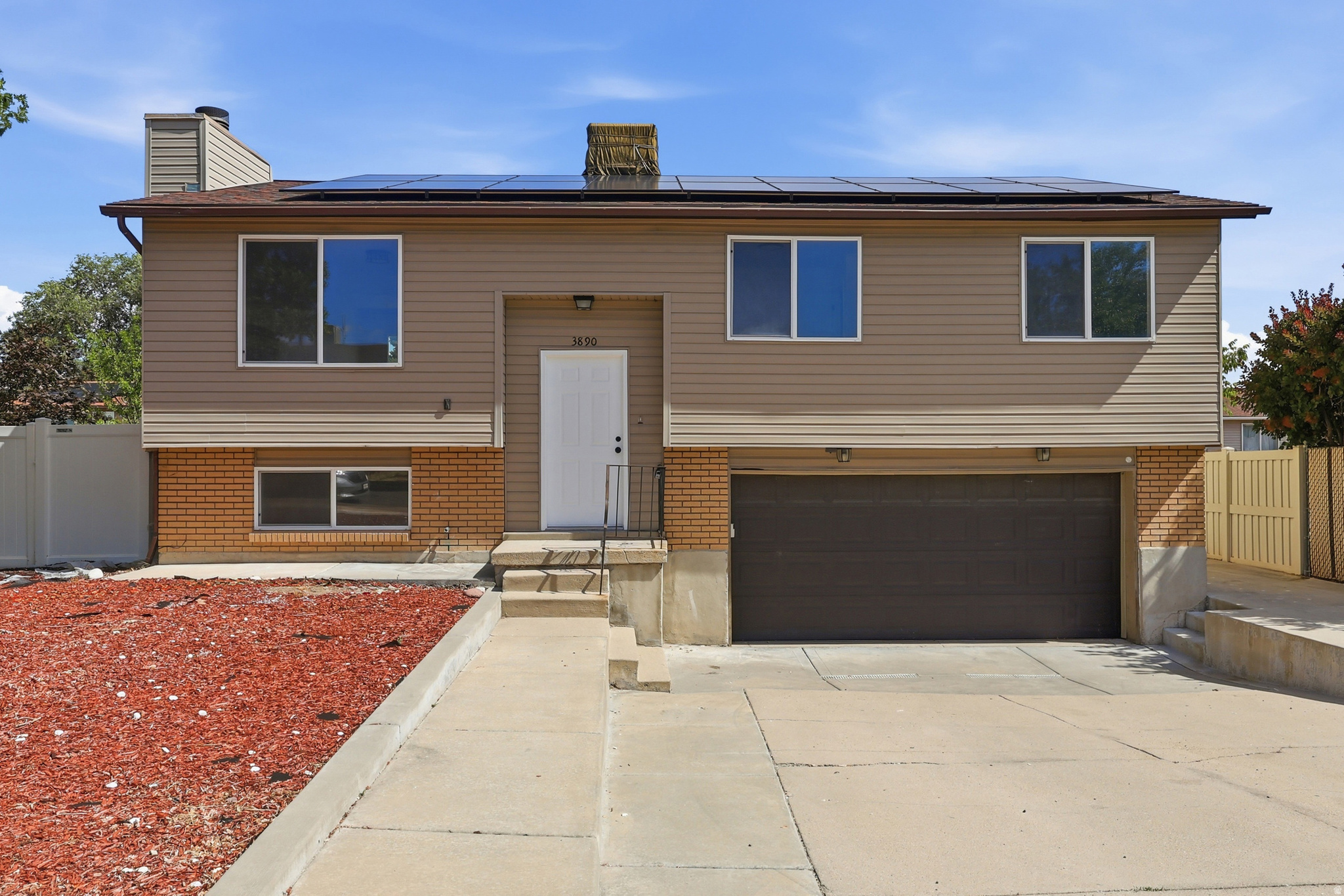 Completely Renovated & Move-In Ready! This beautifully updated Taylorsville home has been remodeled from top to bottom and is ready for its new owner.  Enjoy a brand-new kitchen with new cabinets, countertops, fixtures, and finishes, along with a completely remodeled bathroom featuring a fresh, modern design.  The home also offers new flooring throughout, fresh interior paint, and updated lighting, doors, trim, and hardware, giving every room a clean, modern feel.  The attached 2-car garage provides plenty of parking and storage, while the paid-off solar panels help keep utility costs down with no solar loan to assume.  Conveniently located near shopping, dining, schools, parks, and major commuter routes, this home offers the perfect blend of style, comfort, and convenience.  This home is covered by a SilverBack Home Warranty Listing Policy, which can be transferred to the buyer at closing with the purchase of a Buyer's Policy.