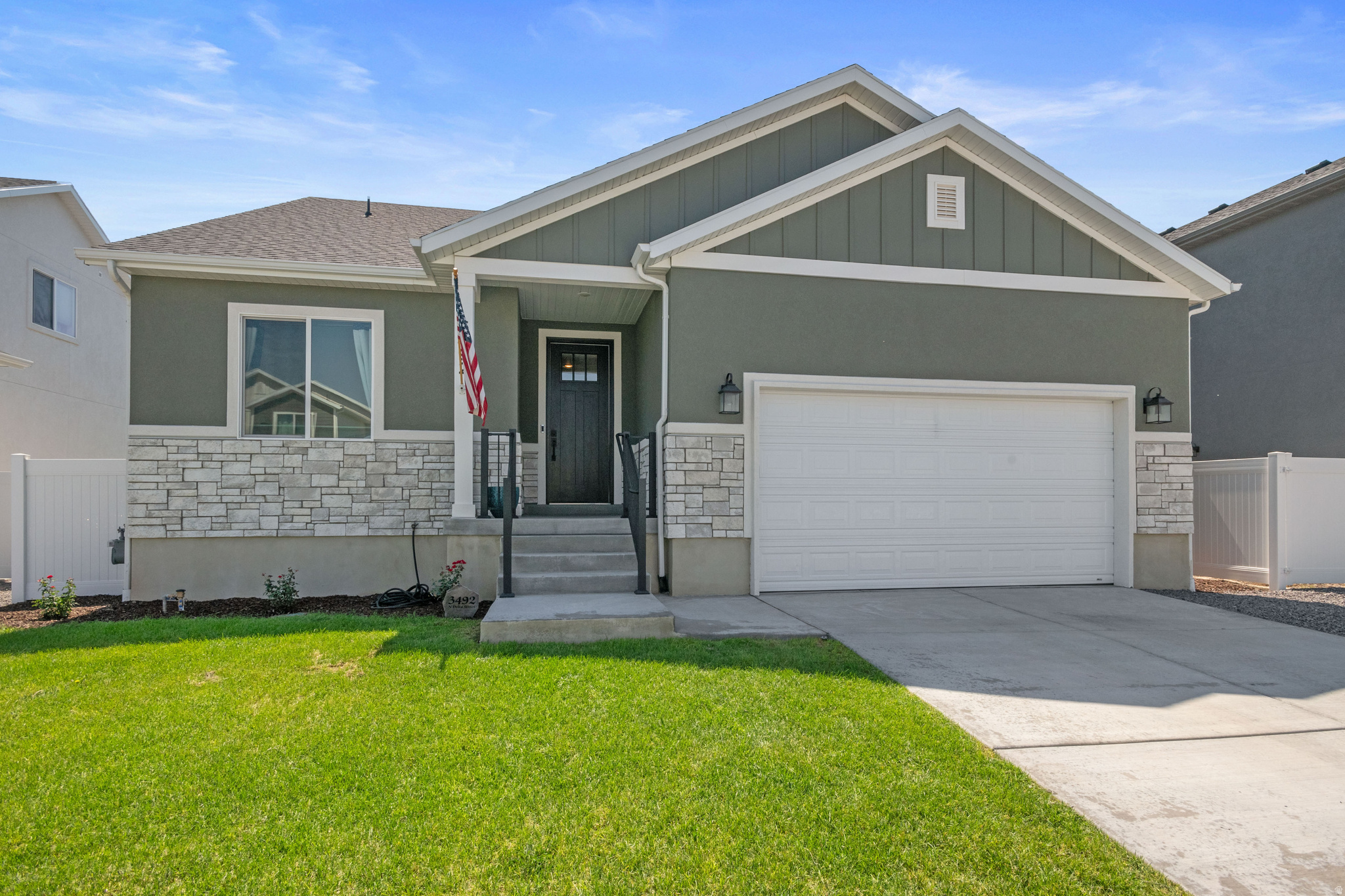 This beautiful Rambler features 8ft front entry door that leads to a bright, fully Open Floorplan with high vaulted ceilings. 6x8 ft glass slider, tall windows for views & sunrises, and an electric fireplace. Large primary Bath has an oversized shower. Black Granite counters, Ziare Black lighting- and Black Halifax hardware. White, under-mount kitchen sink with upgraded Black Plumbing package. Custom mudroom with built-ins. The fully finished permitted basement makes this home 6 bedrooms with a Tankless Water Heater, Water Softener, and Radon mitigation system. It is fully landscaped with unobstructed mountain views & a tremendous one-acre park behind. Friendly neighborhood with Stores, restaurants, parks, pickleball and schools nearby. Hiking, biking, and ATV trails are just minutes away. Come see this fantastic home today! Mortgage savings may be available through the listing agent's in-house lender; ask for details.