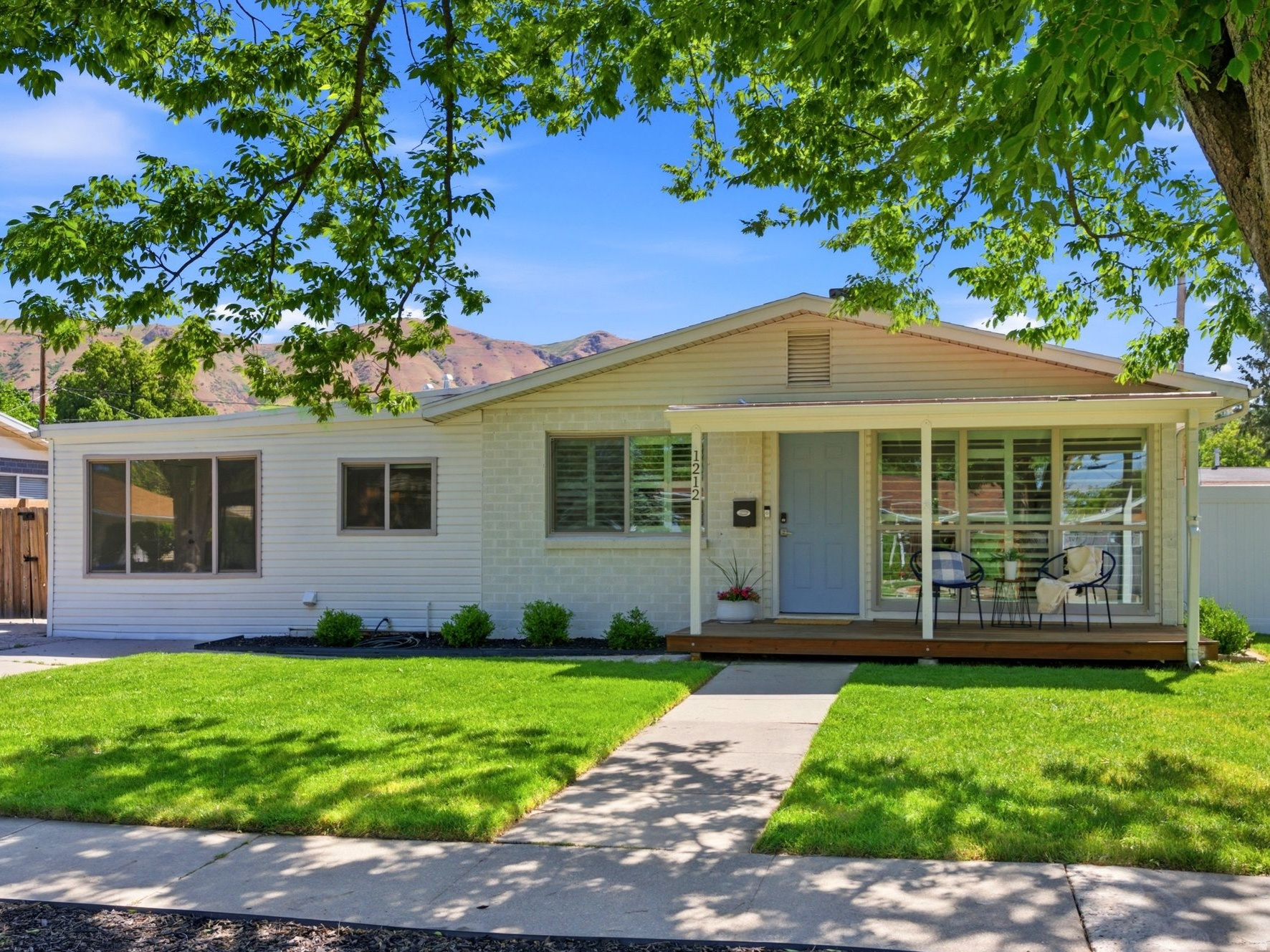 Located on a quiet, tree-lined street, this thoughtfully designed single-level home offers a rare combination of comfort, flexibility, and built-in income potential. Filled with natural light, the inviting floor plan feels open and functional, with spaces that flow easily for everyday living and entertaining.  One side features a spacious 3-bedroom, 2-bath layout, while the attached 2-bedroom, 1-bath mother-in-law suite includes its own private entrance and laundry-ideal for rental income, multigenerational living, or extended guest space.  Enjoy mornings on the covered front porch or evenings in the freshly landscaped backyard, updated in 2025. A newly added shed with electrical offers the perfect setup for storage, hobbies, a workshop, or additional storage.  Inside, fresh paint throughout gives the home a clean, move-in ready feel. Additional updates include a new water heater (2022), the addition of a kitchen, bathroom, and laundry in the mother-in-law suite (2022), mini-splits added to the suite (2024), and a new sprinkler system installed in 2025.  Versatile, well-maintained, and full of potential, this home offers flexible living options in a peaceful neighborhood setting. Buyer is responsible to verify all listing information, including square feet/acreage, to buyer's own satisfaction.