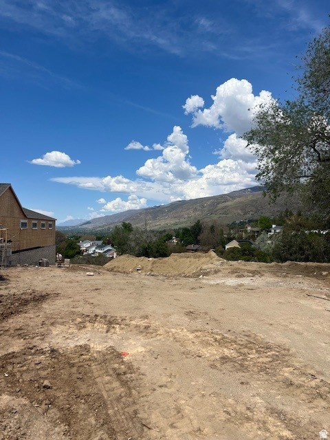 Build your dream home on Lot 5 in the desirable Creek Side Views Subdivision in Bountiful. This 1.21-acre south-facing lot offers beautiful mountain and valley views in a peaceful cul-de-sac setting with no rear neighbors. Bring your own builder and join a newer community with stunning custom homes already completed. Conveniently located within walking distance to Valley View Elementary, Mueller Park Jr. High, and Bountiful High School. Enjoy nearby hiking and biking trails, parks, and golf courses, while being just 15 minutes from downtown Salt Lake City and Salt Lake City International Airport, and only 45 minutes from world-class ski resorts.