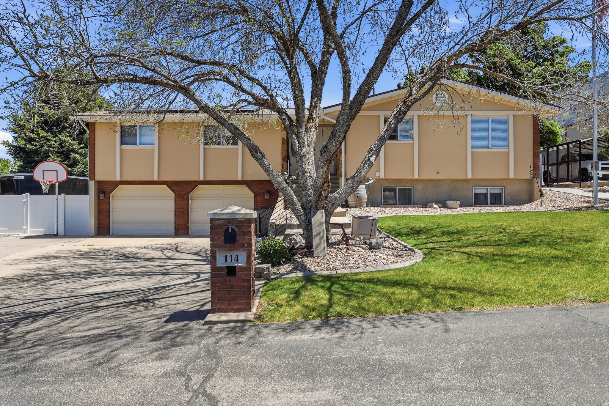 Spectacular mountain views meet high-end upgrades in this stunning retreat near Gladstan Golf Course. This home is fully updated for peace of mind with paid-off solar panels with two Tesla back up batteries, a new metal roof, new furnace, new AC, and a new tankless water heater. The interior features new LVT flooring throughout the upstairs and two freshly remodeled bathrooms. Enjoy a cheery gourmet kitchen with granite and hardwoods, plus a spacious master suite featuring a private fireplace and grand bath. Enjoy views of Loafer Mountain and the valley. The fully fenced backyard is an entertainer's dream with a patio, included shed and auto-sprinklers. Includes a cozy finished basement with fireplace, extra-deep 2-car garage, and RV parking. Secluded, peaceful, and just minutes from trails and Salem High-this home has it all.