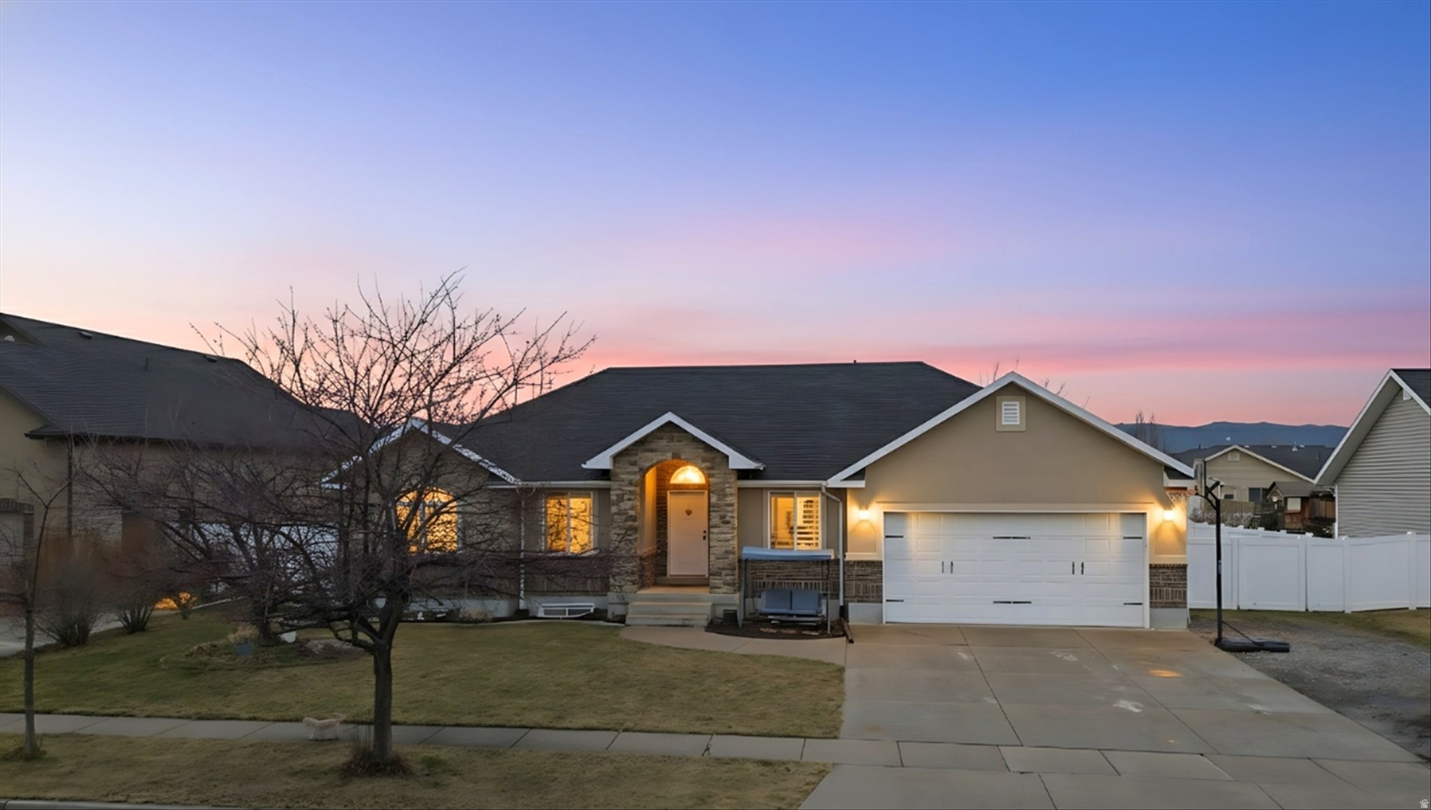 This beautifully maintained rambler offers comfortable main-level living with the added space of a fully finished basement. The updated kitchen features modern finishes and a functional layout, perfect for everyday living and entertaining. Step outside to a large, fully fenced backyard where you can relax and take in the stunning views of the Wellsville Mountains. With plenty of space both inside and out, this home combines convenience, comfort, and incredible scenery in a setting you'll love coming home to.