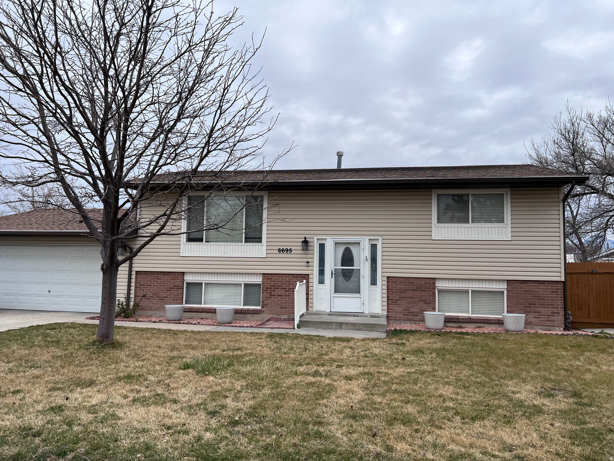Welcome to this beautiful home near Jordan's Landing. Granite countertops, spacious deck with mountain views, RV parking, space for a second kitchen possibility, basement entrance from garage, large workshop for extra storage. Prime location near restaurants and shopping. Easy access to airport via Bangerter hwy.