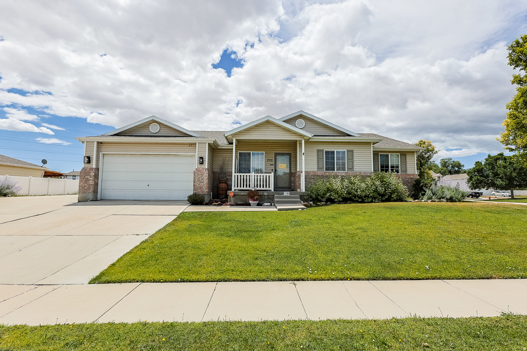 Spacious rambler with a fully finished basement on a 1/3-acre corner lot with no HOA! The main level features vaulted ceilings, a spacious kitchen with quartz countertops, a large island, included appliances, two living rooms, and an oversized primary suite with a jetted tub, separate shower, and walk-in closet.  The finished basement offers tall ceilings, large windows, a second primary suite, an expansive family room plus a huge laundry/storage room. Enjoy the covered patios, Trex deck, water feature, above-ground pool, permanent trim lighting, and security system. A 3-car garage/workshop, three driveways, RV parking, and space for 12+ vehicles make this property ideal for all your vehicles and toys. Conveniently located near schools, parks, walking trails, shopping, and freeway access.  Square footage figures are provided as a courtesy estimate only and were obtained from previous MLS .  Buyer is advised to obtain an independent measurement.
