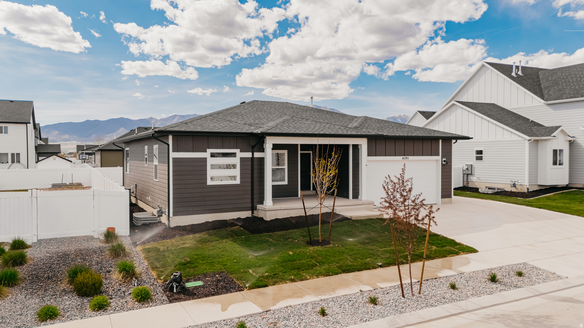 Seller is offering a fridge, washer, dryer, a fully-landscaped yard, full fencing AND a 1 year buy down! You can't beat this! Welcome to this brand-new single-story home in the highly desirable Antelope Meadows community-featuring a fully-legal ADU with income producing potential and over $150K in upgrades throughout! Step inside to a bright, open-concept layout with 9-foot ceilings - two family rooms - two kitchens - and a modern, elevated design. The main floor offers 3 spacious bedrooms, 2 full bathrooms, and a generous great room perfect for entertaining. The stylish kitchen is a true centerpiece, complete with stainless steel Whirlpool appliances - upgraded flat-bar railing - and more!  Downstairs, you'll find a permitted 2-bedroom, 1-bathroom ADU that fully complies with Eagle Mountain City zoning. Designed with a private, enclosed entrance, this space provides incredible flexibility-ideal for rental income, multigenerational living, or hosting long-term guests. With its own 9-foot ceilings and open feel, the basement lives just as comfortably as the main level.  This turnkey home offers the best of new construction with built-in versatility and long-term value. Don't miss your opportunity to own one of the few homes in the area with a fully legal ADU. Must use preferred lender. Additional conditions/qualification and restrictions may apply.