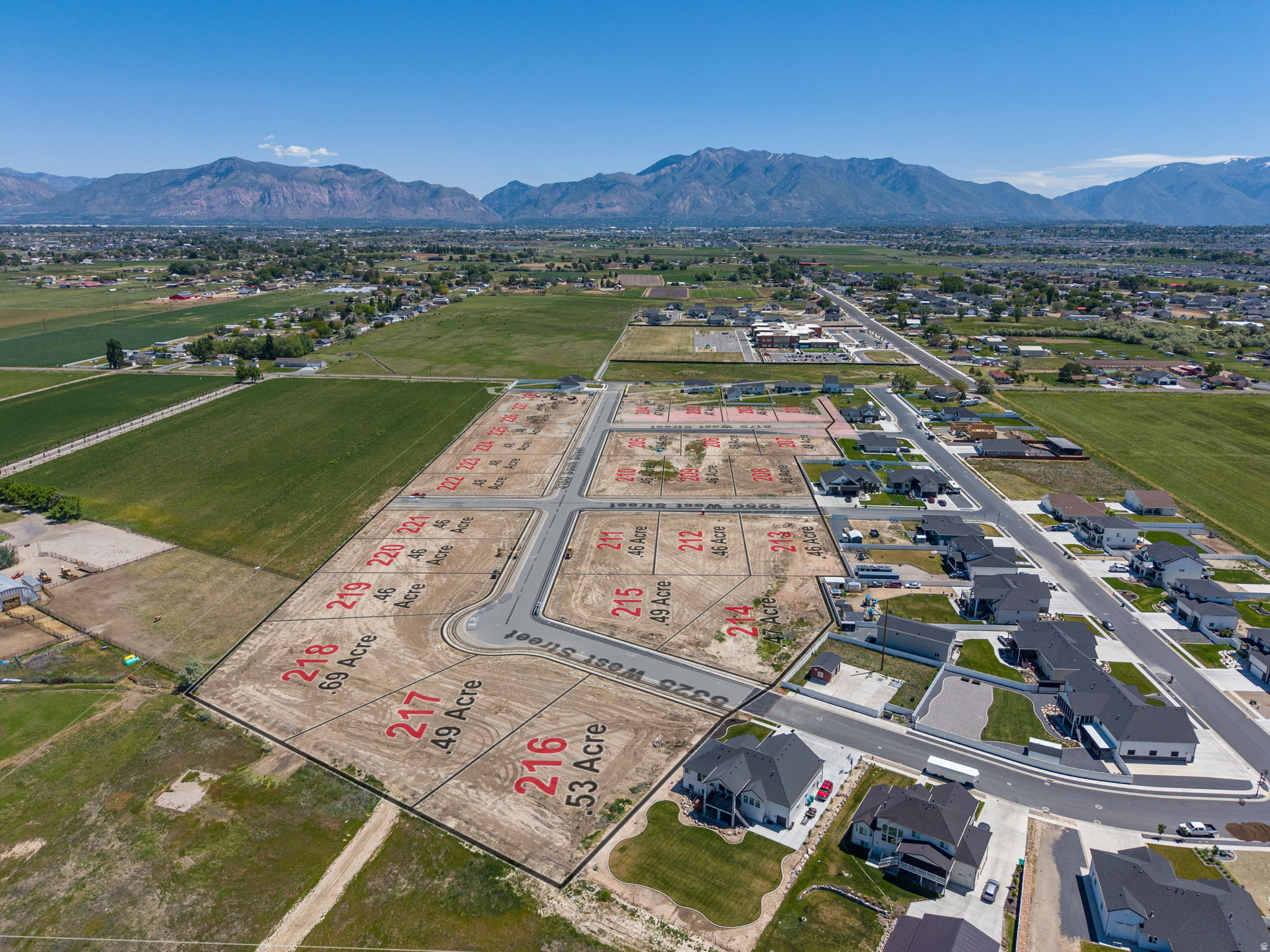 Lot 207 - Rawson Ranch - Phase 2 is a 28-lot subdivision in the peaceful countryside of Hooper, Utah, offering large, near half-acre building sites that are hard to find these days! These lots have stunning mountain views and ample space for a comfortable family home, barn, or shop, all without an HOA. You can choose your own builder, or we can happily recommend several reputable options. There are multiple lots currently for sale, please contact the listing agent to confirm which ones are available. If you value flexibility, space, and a serene rural setting within easy reach of amenities, Rawson Ranch is a great option! Reach out to discuss available lots, and start planning your custom home!