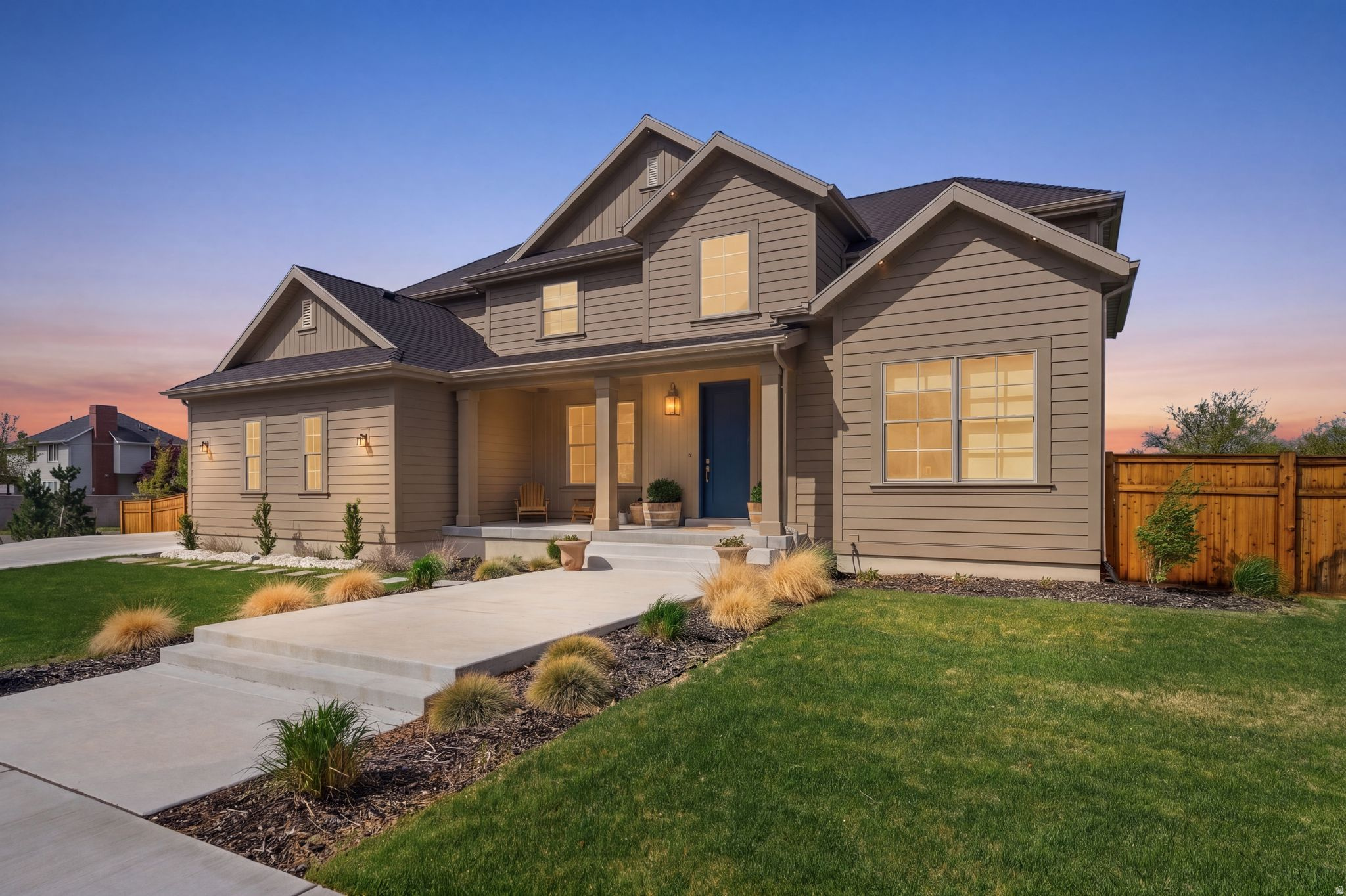 This beautifully crafted and extensively upgraded Ivory Homes residence offers over 5,500 square feet of thoughtfully designed living space, seamlessly blending luxury, comfort, and functionality. Rich hardwood floors, expansive Pella windows, designer finishes, and a dramatic grand staircase create a striking first impression, while the open-concept floor plan is ideal for both everyday living and entertaining. The spacious great room features a gas fireplace and generous space for casual dining, flowing effortlessly into the remarkable kitchen. Designed with both style and practicality in mind, the kitchen showcases custom cabinetry, Dekton countertops, upgraded appliances, and a walk-in pantry, blending traditional charm with modern convenience. The main level also includes a private east-facing office with French doors and beautiful mountain views, a versatile flex room ideal as a formal dining room or additional office, and a main-floor guest suite complete with a full bath and generous walk-in closet. A well-appointed mudroom, powder bath, and oversized three-car garage add to the home's exceptional functionality. Upstairs, the gracious primary suite includes a spacious bedroom, oversized walk-in closet, and luxurious bath with a soaking tub and separate shower. Three additional bedrooms, each with a walk-in closet, share a three-quarter bath, and the laundry room is conveniently located on this level. All spaces feature large windows that maximize natural light and showcase beautiful views, complemented by custom blinds for privacy where needed. The unfinished lower level offers more than 2,000 square feet of future living space and is already plumbed for a bathroom, providing the opportunity to finish it to your specifications. Outside, the fully landscaped, level yard has been thoughtfully designed for beauty and ease of maintenance, featuring a complete drip and sprinkler system, drought-tolerant trees, and perennial plantings. The cedar-fenced backyard offers exceptional outdoor living with a covered deck perfect for entertaining, an in-ground trampoline, and expansive lawn space for soccer, croquet, or other outdoor activities. Located within one of the area's most desirable Ivory Homes communities, this exceptional property benefits from quality construction and numerous builder and owner upgrades throughout. Situated on a quiet cul-de-sac, the home is just steps from Bell Canyon Park, offering playgrounds, tennis courts, and picnic areas. The location also provides excellent freeway access and is conveniently close to ski resorts, downtown Salt Lake City, the University of Utah, Salt Lake City International Airport, and Silicon Slopes.  Square footage figures are provided as a courtesy estimate only.  Buyer is advised to obtain an independent measurement.