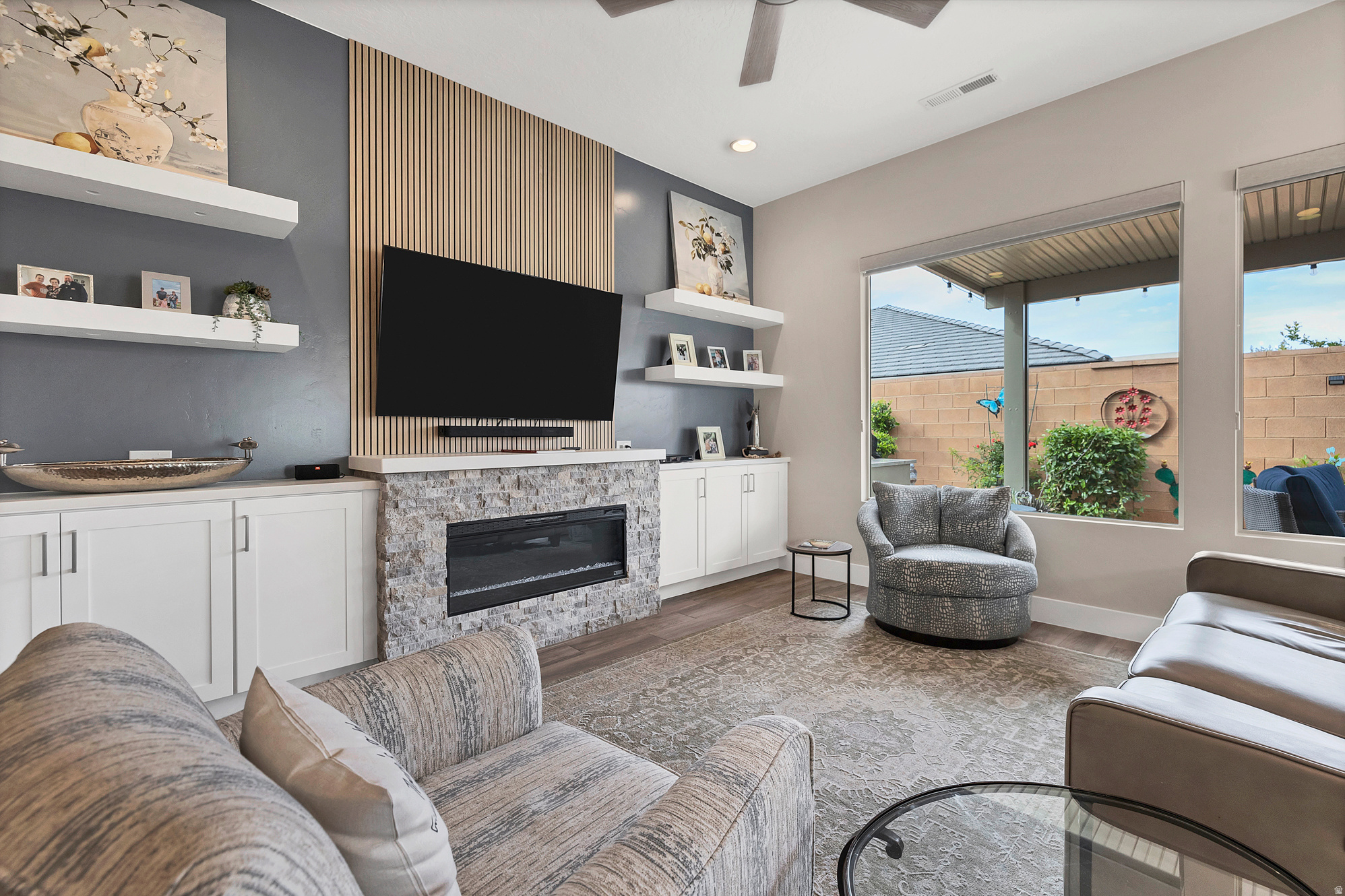 Located at SunRiver Villas just off exit 2. Lots of exciting new businesses coming in. Smiths, In and Out, Cafe Rio, costco just to name drop! This was a very nicely upgraded unit before they added a fireplace wall, new tile shower, new carpet and outdoor kitchen! SunRiver Villas is a great size community with 339 units. Get to know all your neighbors and enjoy all the activities at the club house with Pool and Pickleball. 55 or older community with access to SunRiver Golf Course at discounted resident rates.