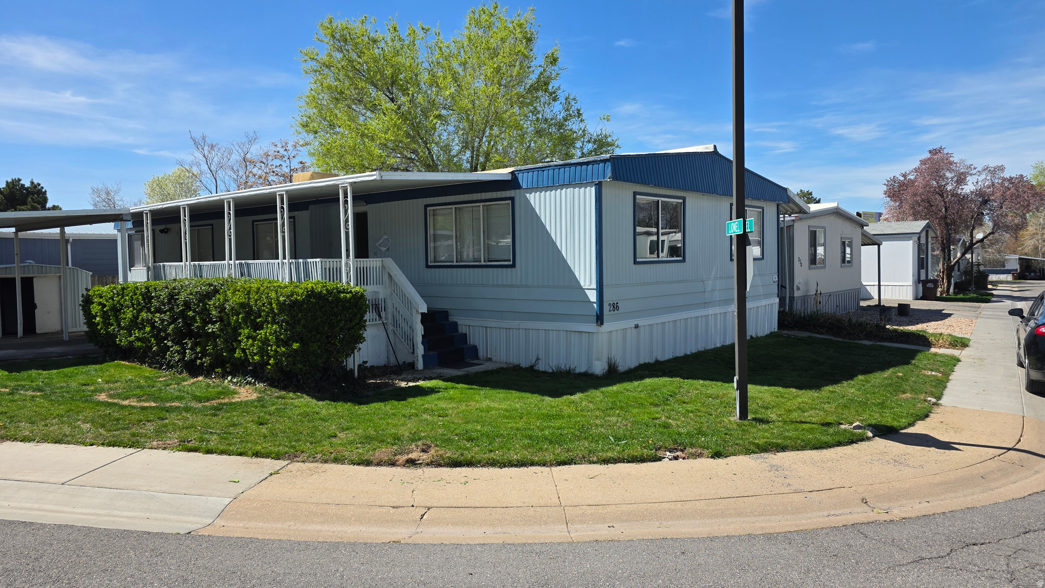 Welcome home! 4 bedroom 2 bath home in most desired mobile home community in North Salt Lake. Corner lot with 2 car carport, but space for a third car. Come see it and make an offer before it's gone.  Beautiful parks, and strong community vibe Quick access to I-15, shopping centers, dining, and just a short walk to TRAX for easy commuting  Affordable & Flexible Financing: Manufactured homes offer incredible value-and now with easy, more affordable financing, contact me for more information.  Square footage from building records; provided as a courtesy. Buyer and Buyer's agent to verify all info. Don't miss your chance to own this beautifully home in a great location! Contact us today to schedule a showing!
