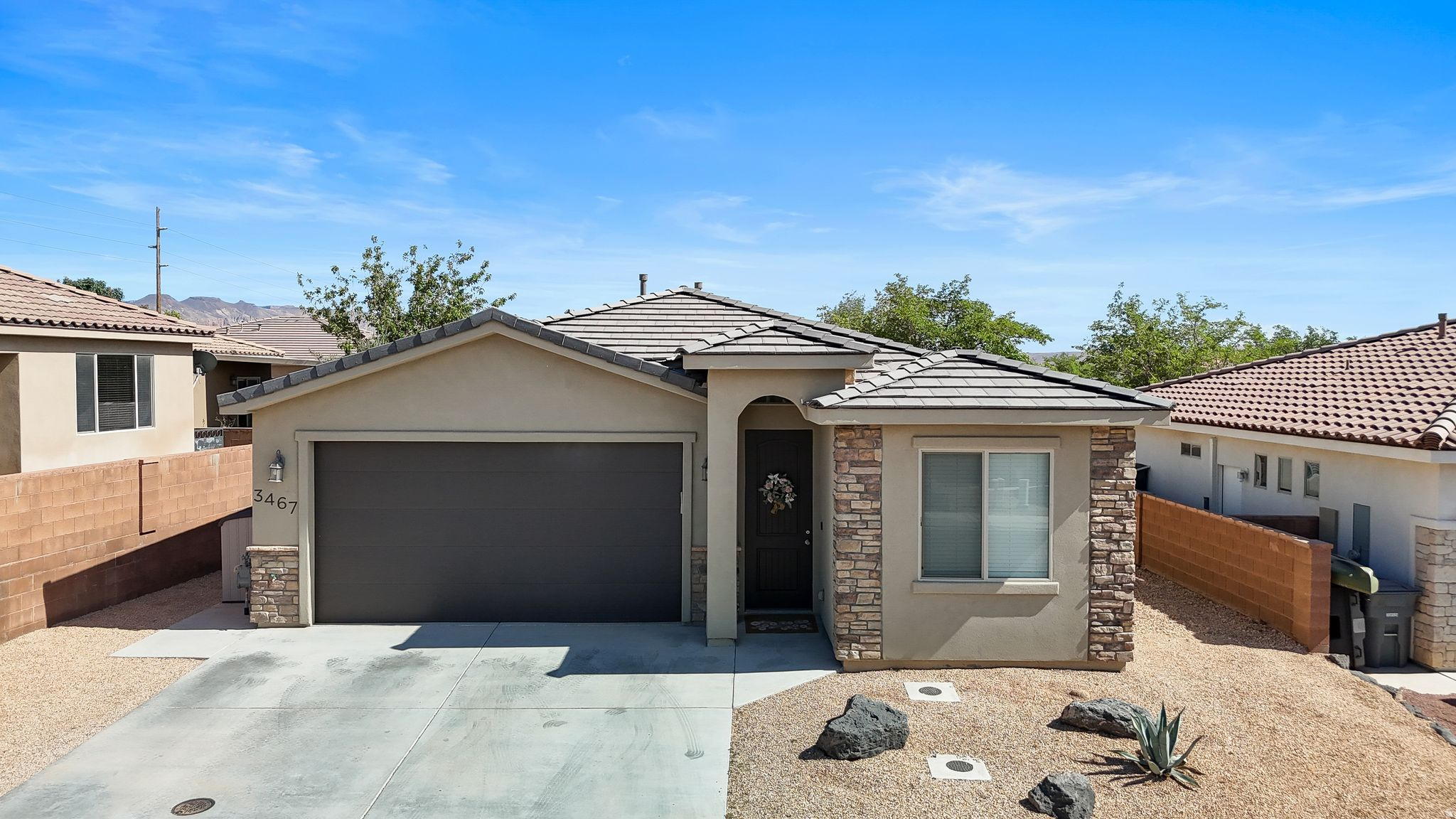 Inviting and exceptionally well-maintained in a desirable Hurricane location near Sand Hollow. This beautiful home has been lovingly cared for and offers a warm, comfortable feel throughout. The functional layout makes great use of the space while providing an easy, low-maintenance lifestyle. Whether you're looking for a primary residence, second home, vacation getaway, or investment opportunity, this property offers flexibility and convenience in an incredible location. Enjoy being just minutes from Sand Hollow Reservoir, golf, hiking, off-road recreation, and everything Southern Utah living has to offer. A well-cared-for home with pride of ownership that truly shows.