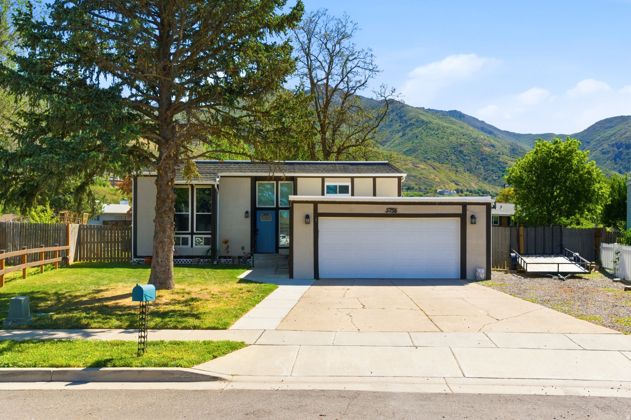 Beautifully updated home in a quiet South Ogden neighborhood with stunning mountain views and a fully fenced backyard! This home has been extremely well-maintained, and features a spacious layout with abundant natural light, updated kitchen cabinets, new granite countertops, and a gorgeous custom blue fireplace that truly makes the living space stand out. Enjoy the covered deck, mature trees, and spacious backyard perfect for relaxing or entertaining. Major updates include New Windows and Roof in 2023, New LVP Flooring throughout, New Water Heater and Water Softener installed in 2023, and recently cleaned & sanitized ductwork throughout the entire home. The AC has also been well maintained and is serviced regularly. All appliances are included with the sale! Conveniently located near parks, schools, shopping, dining, and commuter access. Pride of ownership really shows throughout this home. Buyer is advised to obtain an independent measurement. Call to schedule your showing today! Please text agent if you will be late to your showing time window or unable to make it. Please delay visiting this home if you or one of your clients are experiencing any illnesses or flu-like symptoms. Please include a pre-approval letter or proof of funds with all offers.