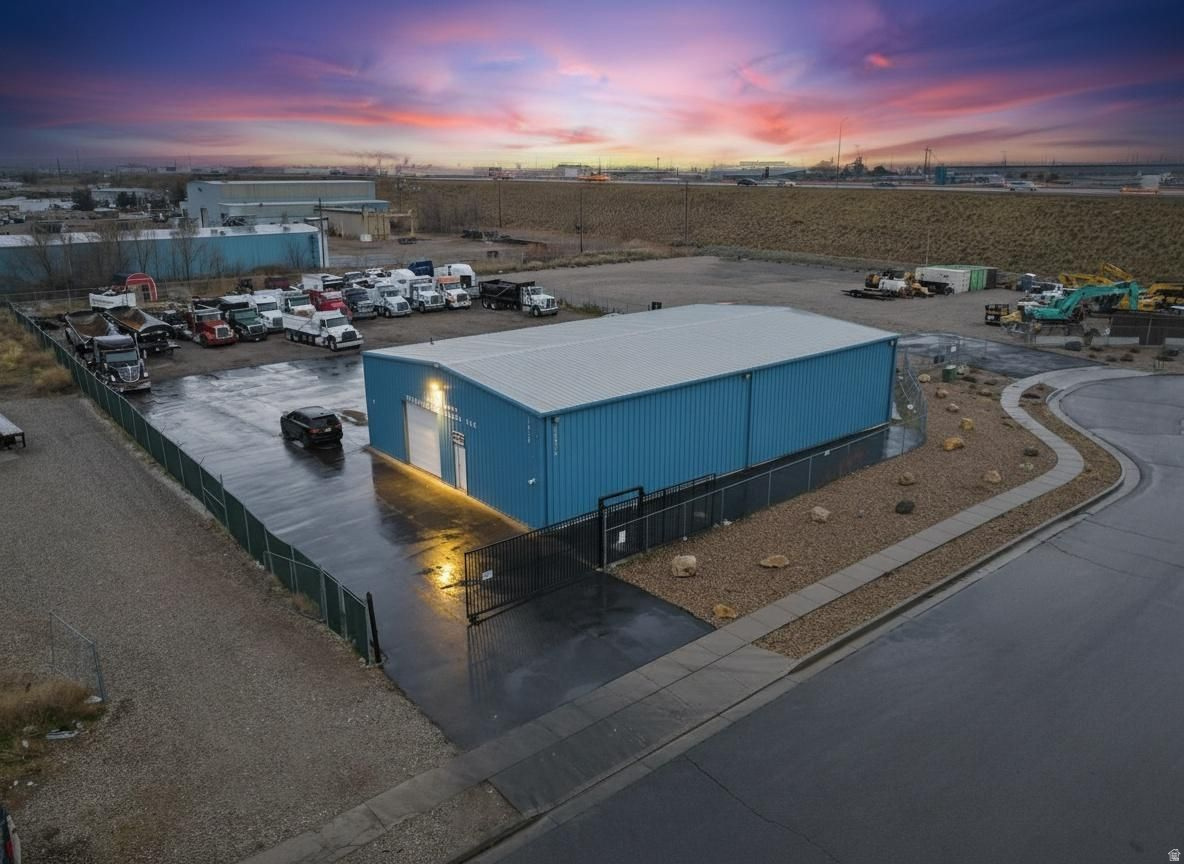 Industrial property situated on just over 1 acre, improved with a 4,000+ sq ft building currently used as a truck mechanic shop. The space includes an office and bathroom and is located in a quiet cul-de-sac surrounded by established industrial warehouses and businesses. 14 ft overhead doors. Prime industrial zoning just minutes from Salt Lake International Airport.  **All information provided is deemed reliable, but is not guaranteed and should be independently verified by buyer and buyer's agent. Square footage figures are provided as a courtesy estimate only and were obtained from the county records .  Buyer is advised to obtain an independent measurement. LINK for Permitted And Conditional Uses for M-1 district: https://codelibrary.amlegal.com/codes/saltlakecityut/latest/saltlakecity_ut/0-0-0-66255.