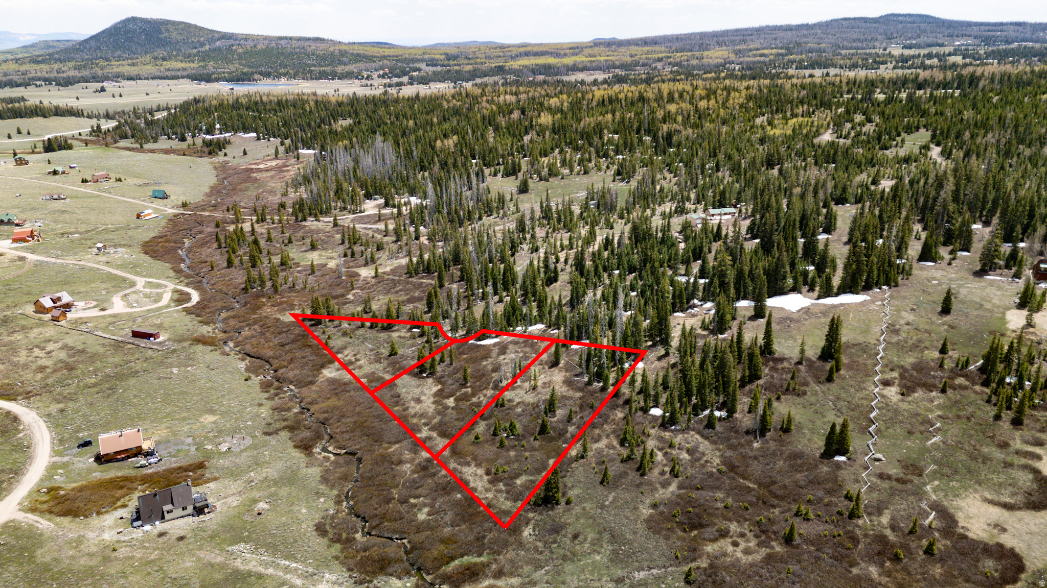 Extraordinary opportunity to own this rare 2.48 acres of mountain property tucked away in the pine and aspen trees with mammoth creek that runs along the north side of the property. Three individual adjacent lots 55, 56 & 57 in total make this a great option for a family getaway to camp, recreate, or build that mountain cabin you always dreamed of. Just minutes from Brian Head Ski Resort, Panguitch Lake, Navajo Lake, Cedar Breaks National Monument, and so much more! Off grid style living but water is available & can be hauled from the fill station. Seasonal access by vehicle in the summer and by snowmobile in the winter months. Escape the summer heat and city lights in exchange for cool fresh mountain air and star gazing nights.