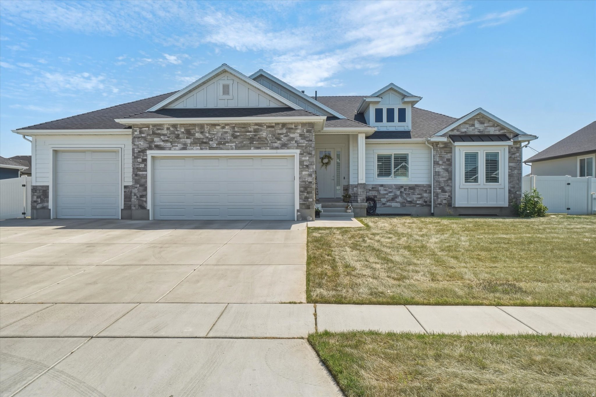 Stunning Marquee Homes Hampton Plan on a landscaped west-facing lot. This home features an open-concept layout with designer accent walls, custom wallpaper, fireplace and more. The spacious kitchen flows seamlessly into the great room, while the primary suite offers a spa-like bath with a relaxing soaker tub. Enjoy a fully finished walk-out basement, covered patio, finished garage, & private backyard complete with a basketball court. Thoughtfully designed with exceptional craftsmanship, this home blends style, comfort, and functionality in one incredible package. A must see! All information is deemed reliable but is not guaranteed. Buyer is responsible to verify all listing information, including square feet/acreage to buyers own satisfaction.